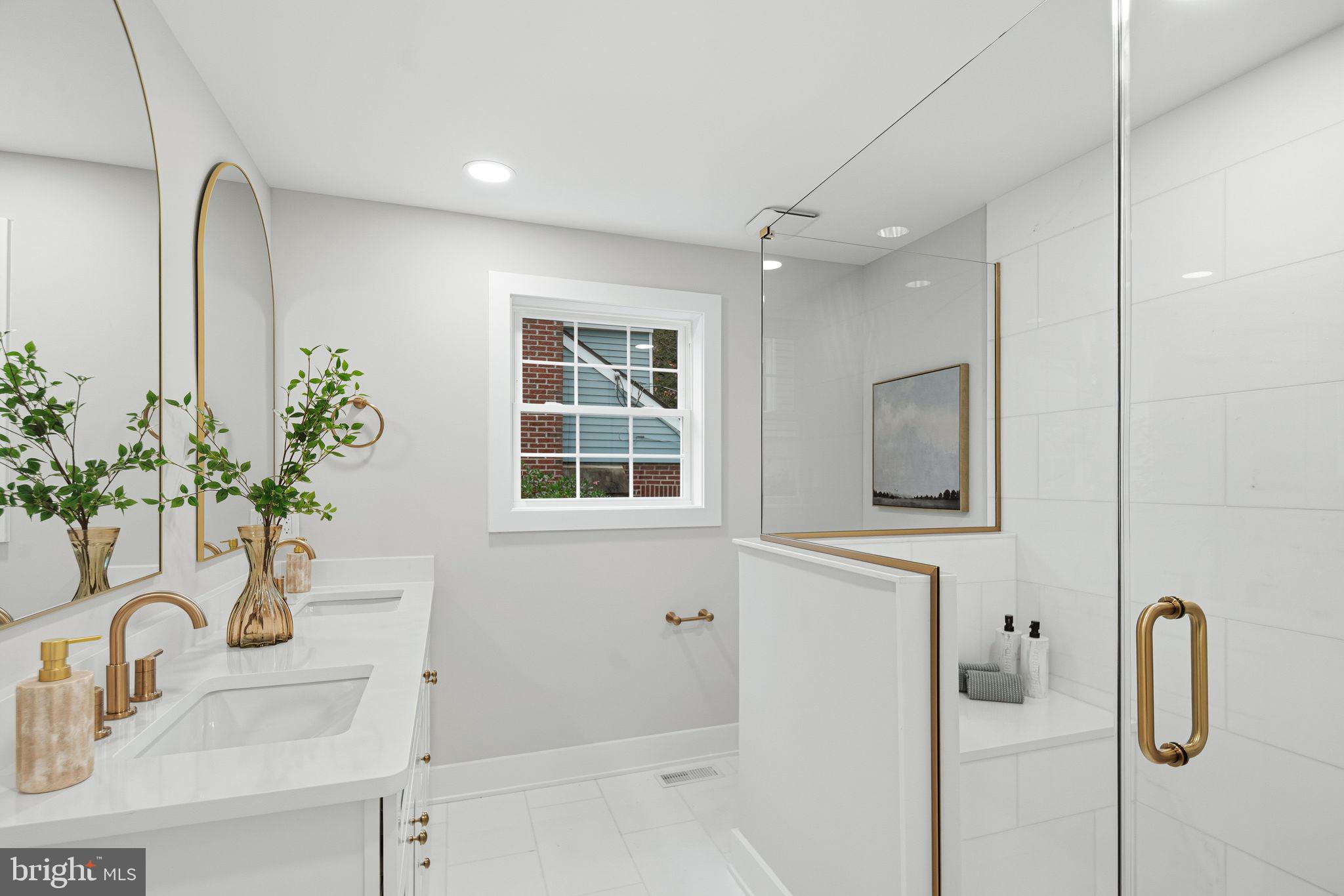 428 Mansfield Avenue Haddonfield, NJ 08033 - Photo 20 of 37 a bathroom with a sink a faucet a mirror and shower