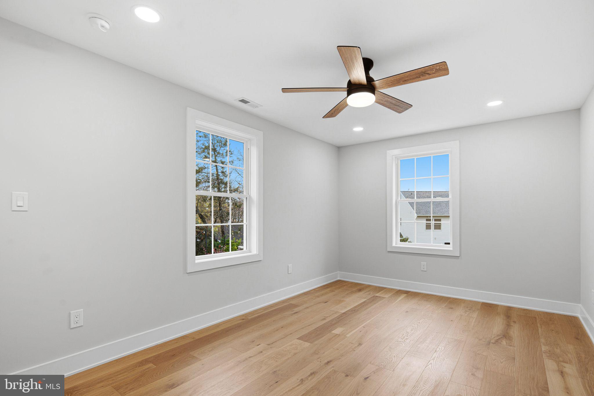 428 Mansfield Avenue Haddonfield, NJ 08033 - Photo 24 of 37 a view of an empty room with wooden floor and a window