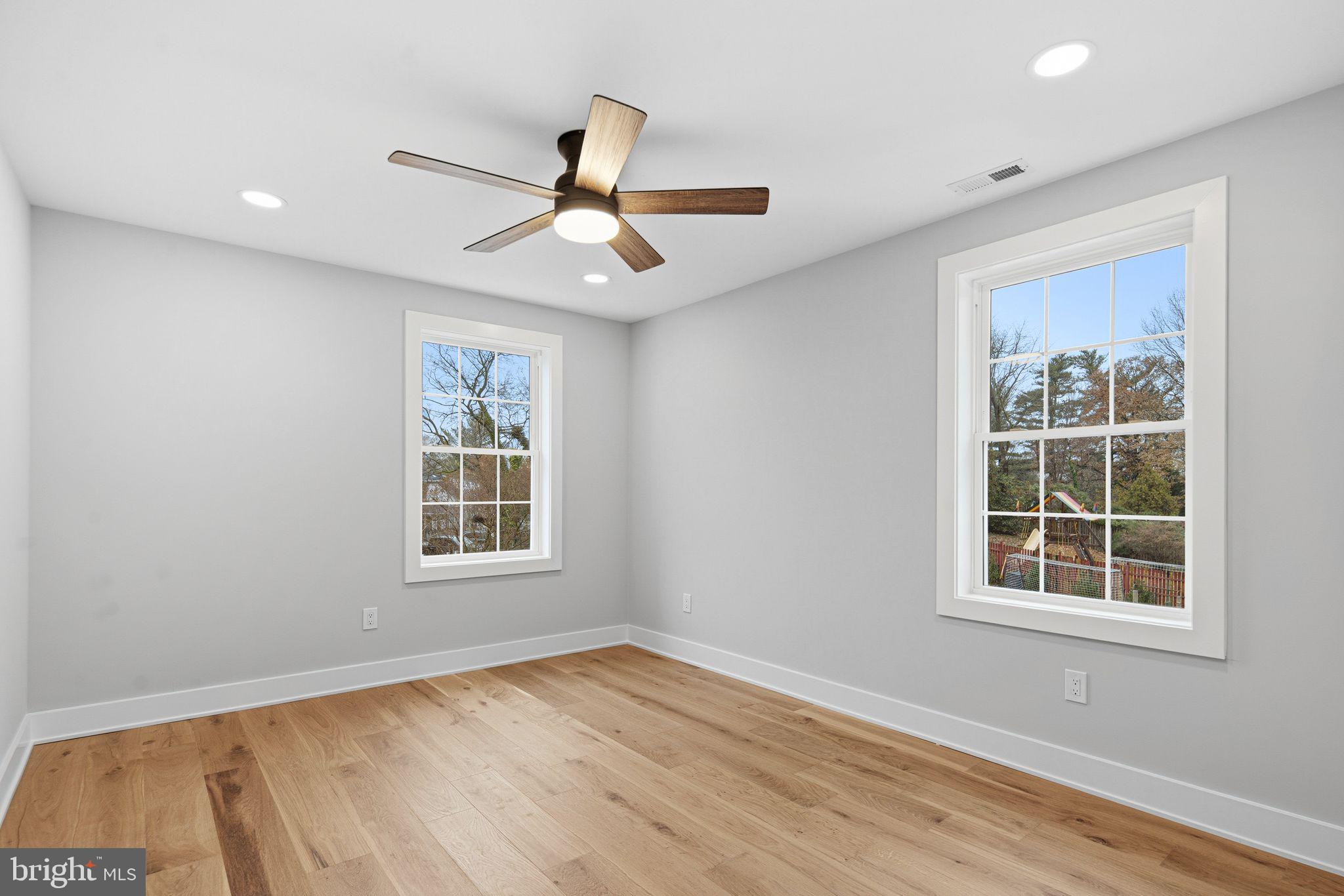 428 Mansfield Avenue Haddonfield, NJ 08033 - Photo 26 of 37 a view of an empty room with a window and wooden floor
