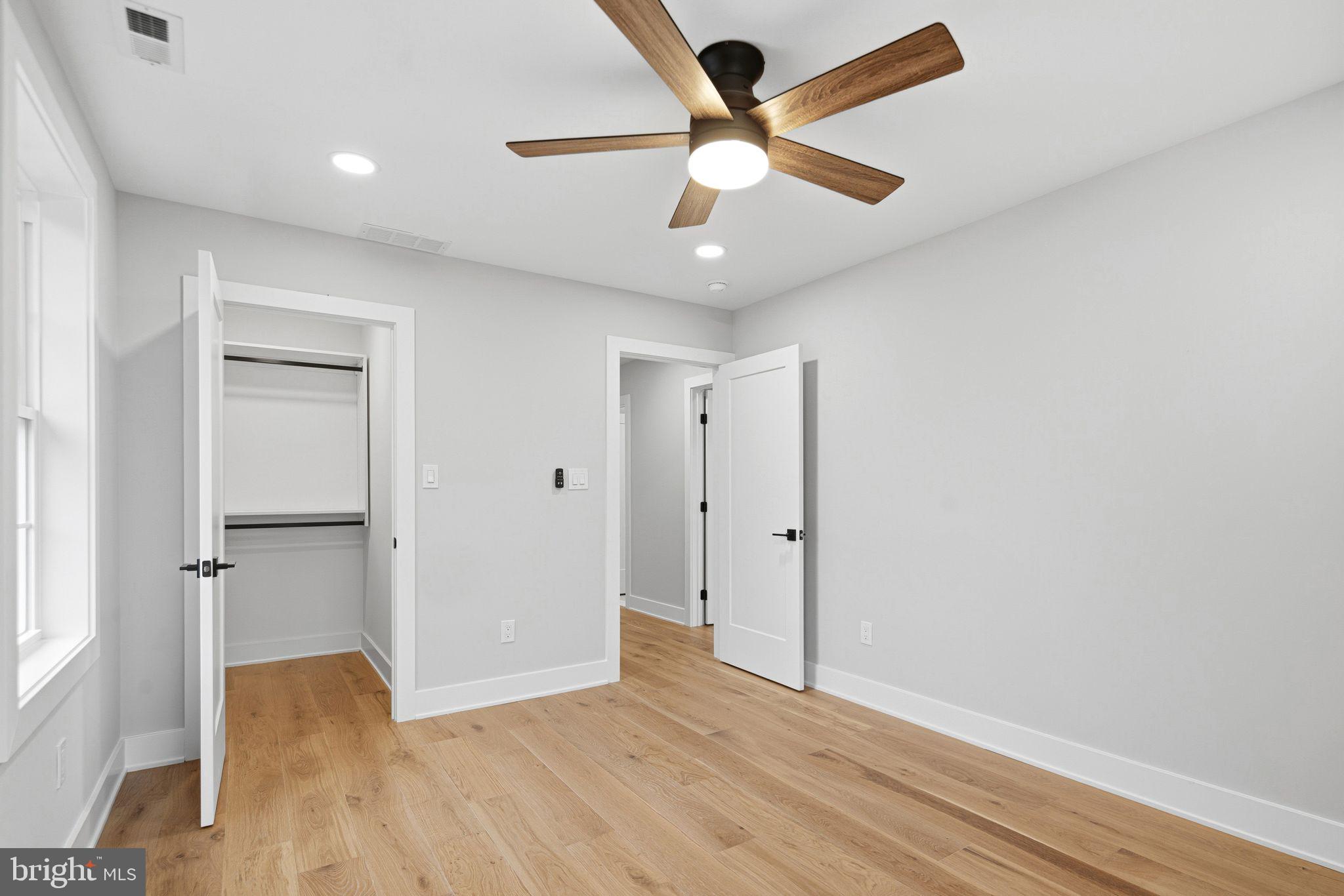 428 Mansfield Avenue Haddonfield, NJ 08033 - Photo 27 of 37 wooden floor in an empty room with a window