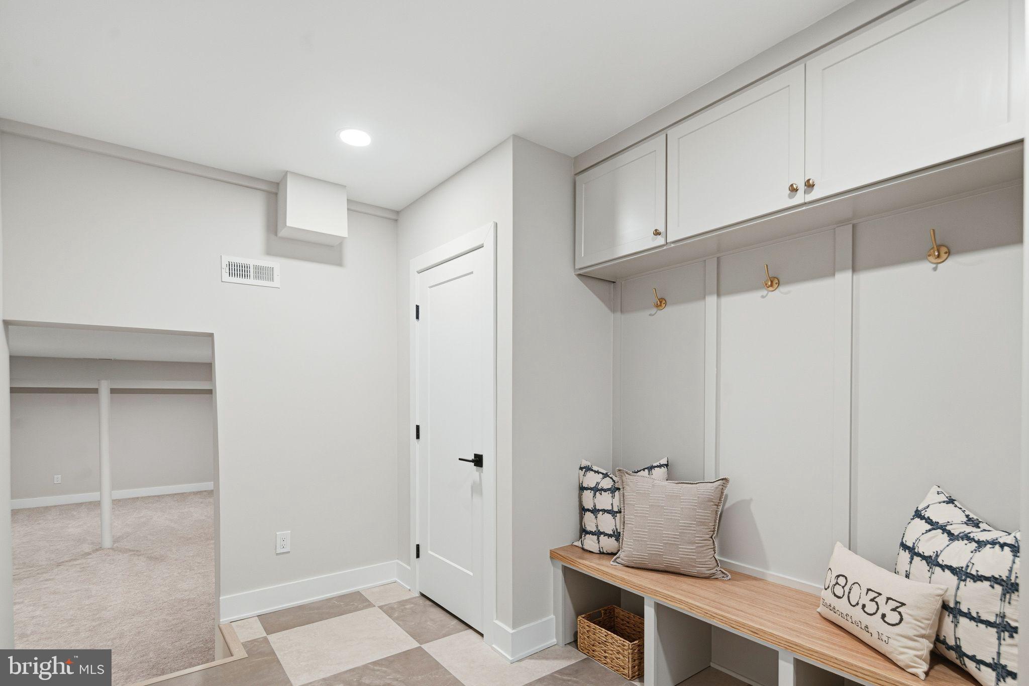 428 Mansfield Avenue Haddonfield, NJ 08033 - Photo 35 of 37 a hallway with furniture and wooden floor