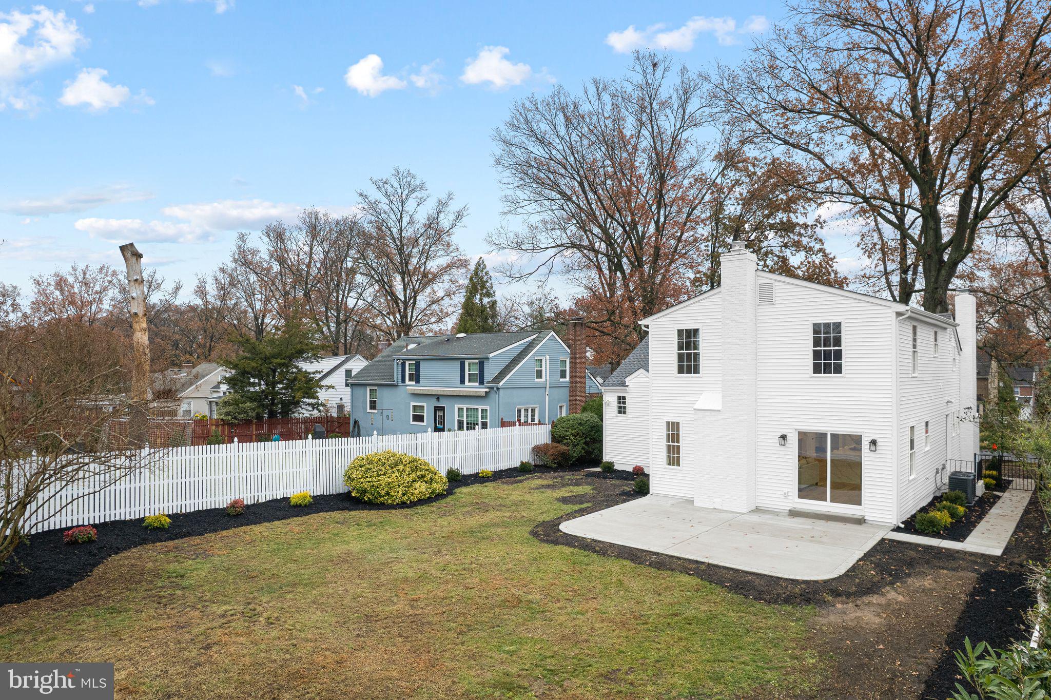 428 Mansfield Avenue Haddonfield, NJ 08033 - Photo 37 of 37 a view of a white house with a yard and large tree