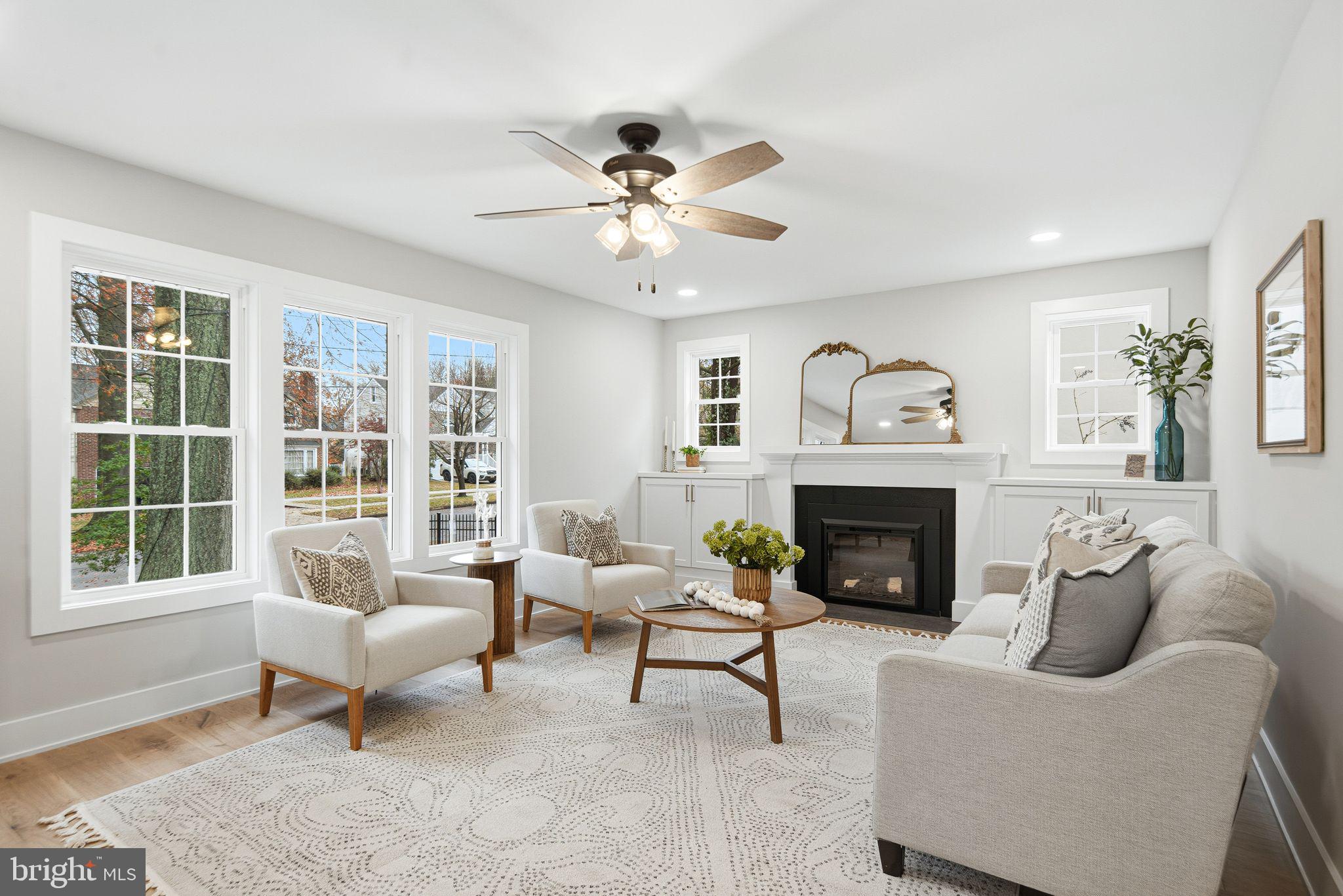 428 Mansfield Avenue Haddonfield, NJ 08033 - Photo 4 of 37 a living room with furniture and a fireplace