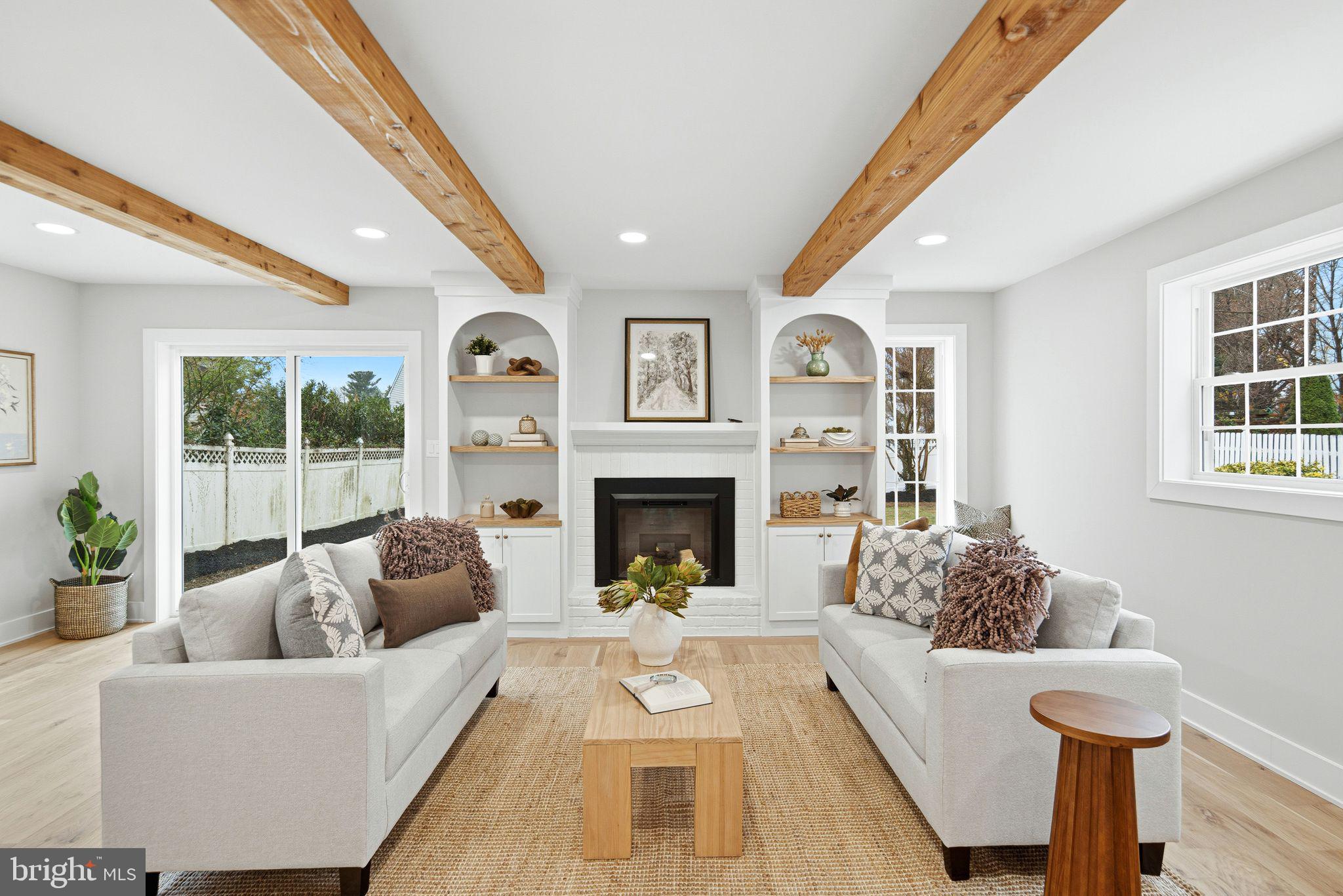 428 Mansfield Avenue Haddonfield, NJ 08033 - Photo 7 of 37 a living room with furniture fireplace and a large window