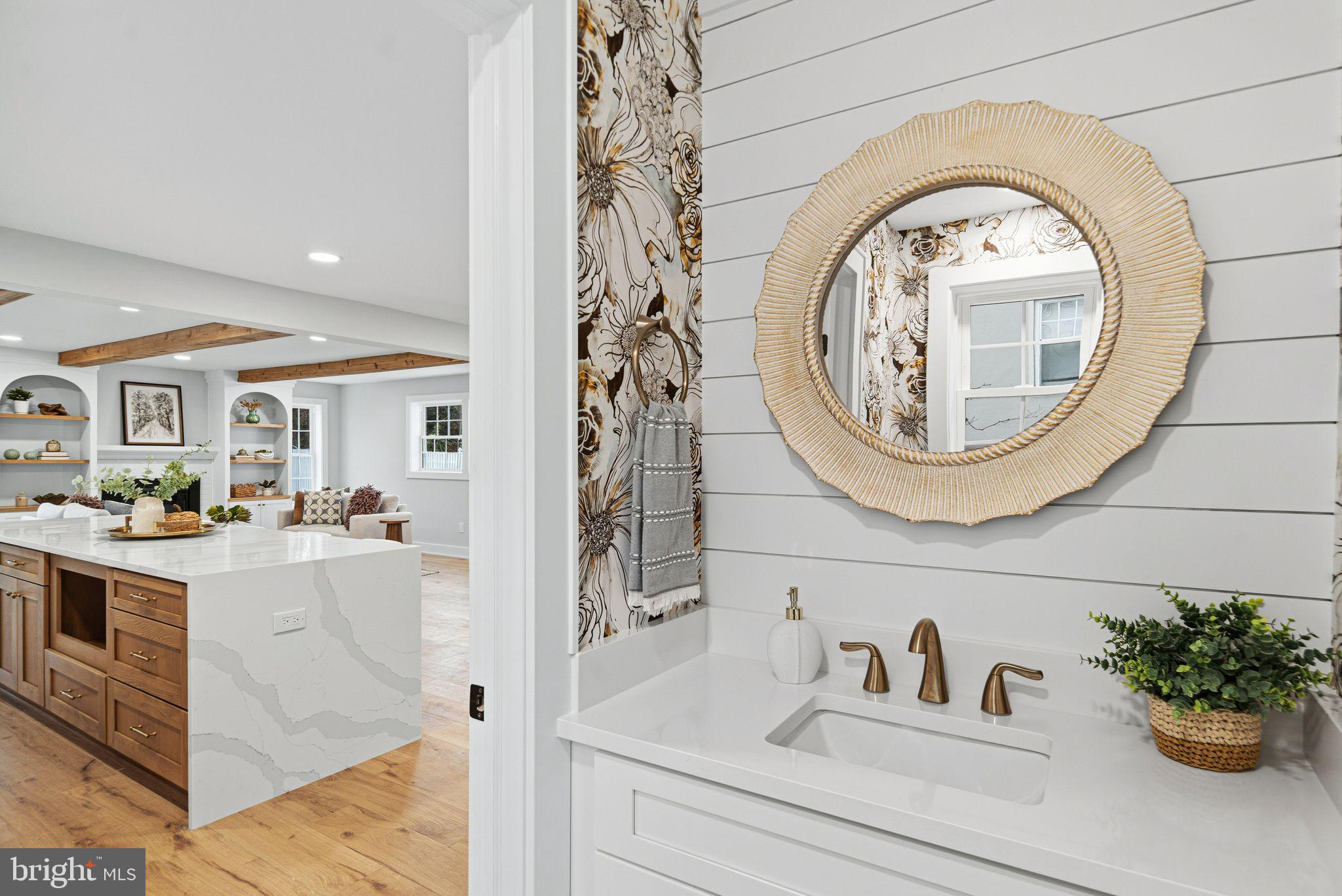428 Mansfield Avenue Haddonfield, NJ 08033 - Photo 10 of 37 a bathroom with a sink and a mirror