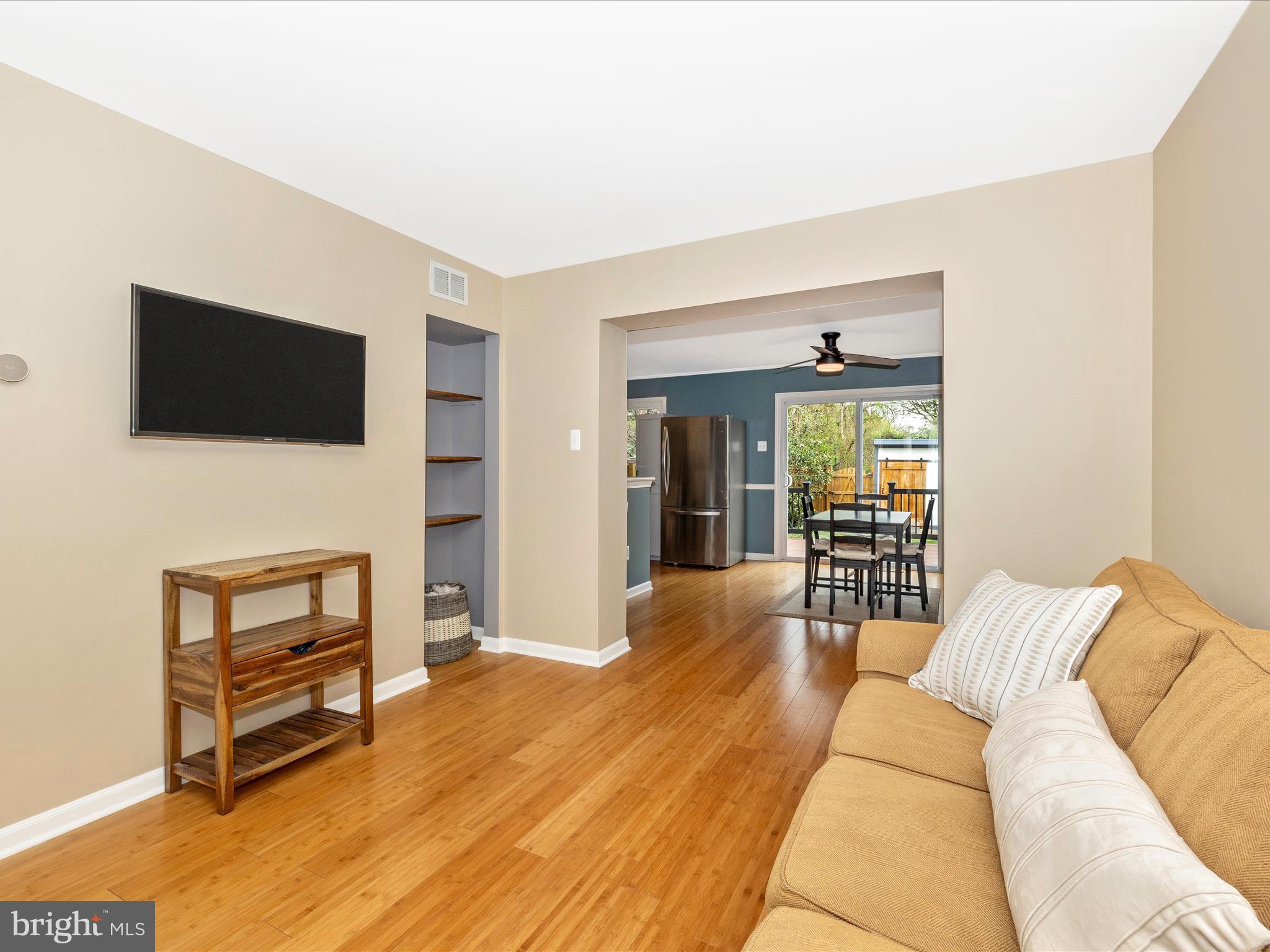 1127 Daffodil Drive Frederick, MD 21703 - Photo 11 of 61 a living room with furniture and a flat screen tv