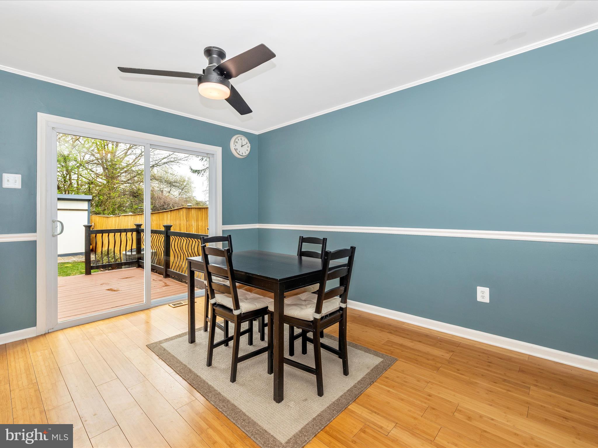 1127 Daffodil Drive Frederick, MD 21703 - Photo 13 of 61 a view of a dining room with furniture window and wooden floor