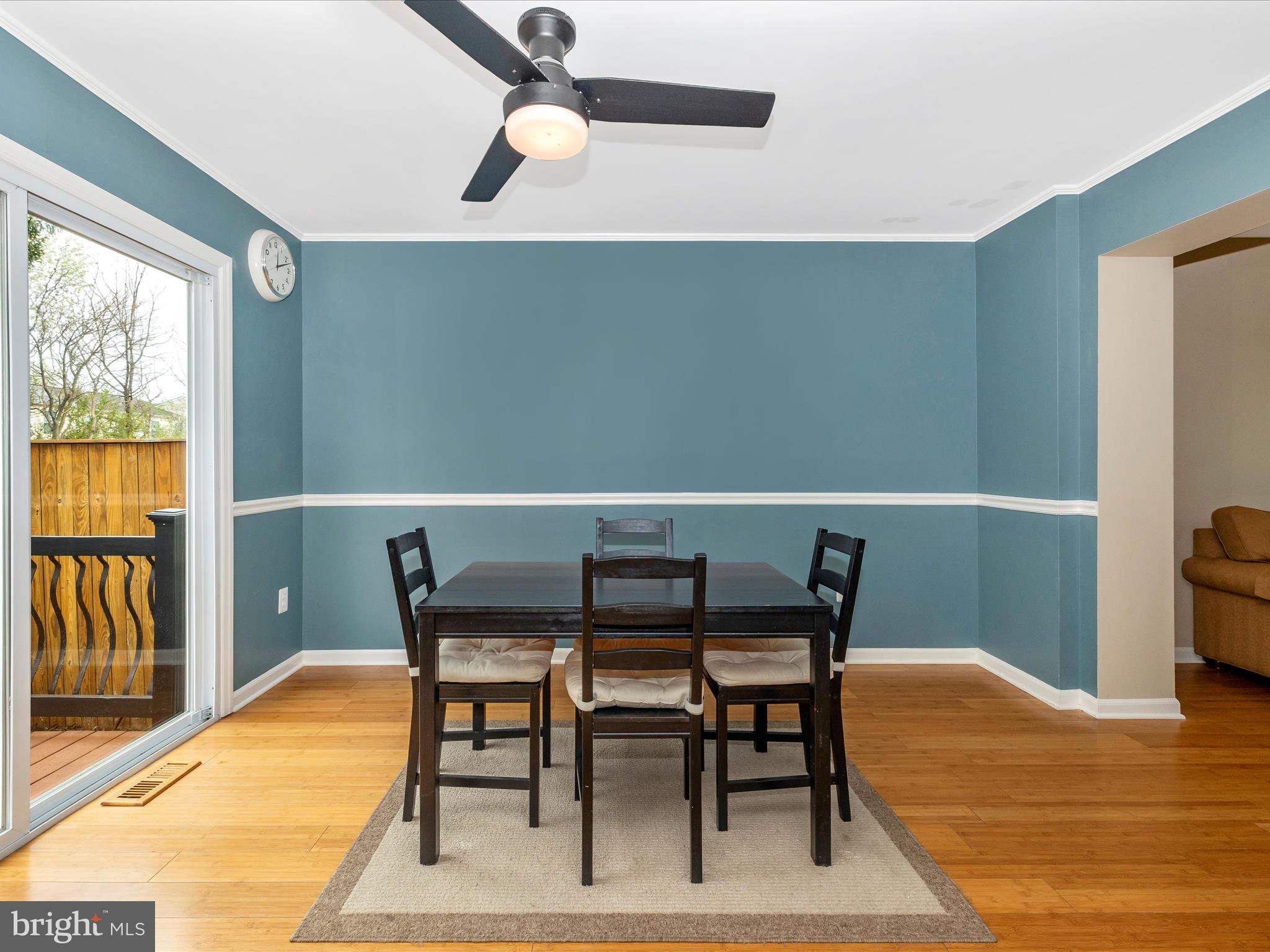 1127 Daffodil Drive Frederick, MD 21703 - Photo 16 of 61 a view of a dining room with furniture and a window