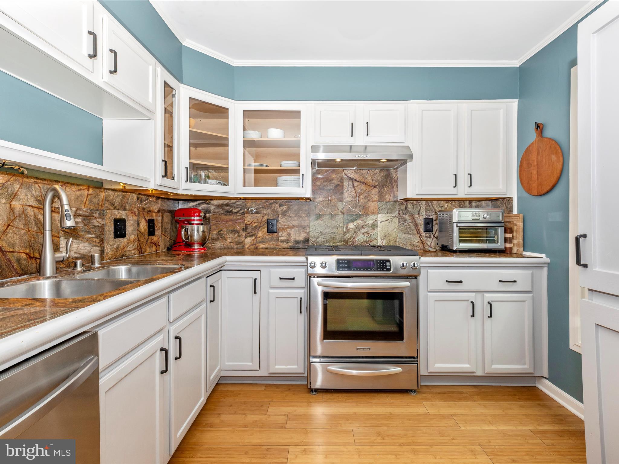 1127 Daffodil Drive Frederick, MD 21703 - Photo 18 of 61 a kitchen with stainless steel appliances granite countertop a stove and a sink