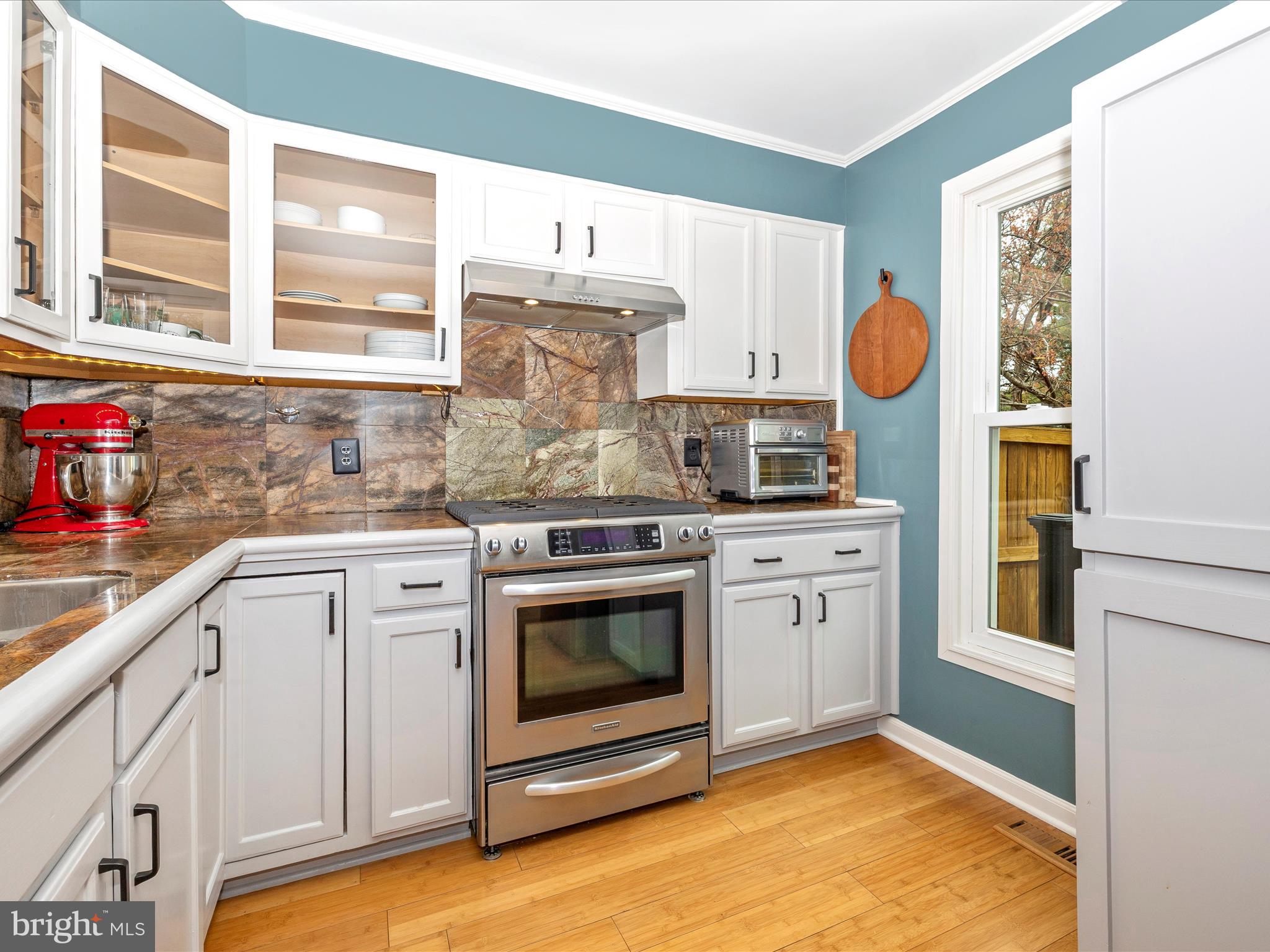 1127 Daffodil Drive Frederick, MD 21703 - Photo 19 of 61 a kitchen with a sink a stove and cabinets