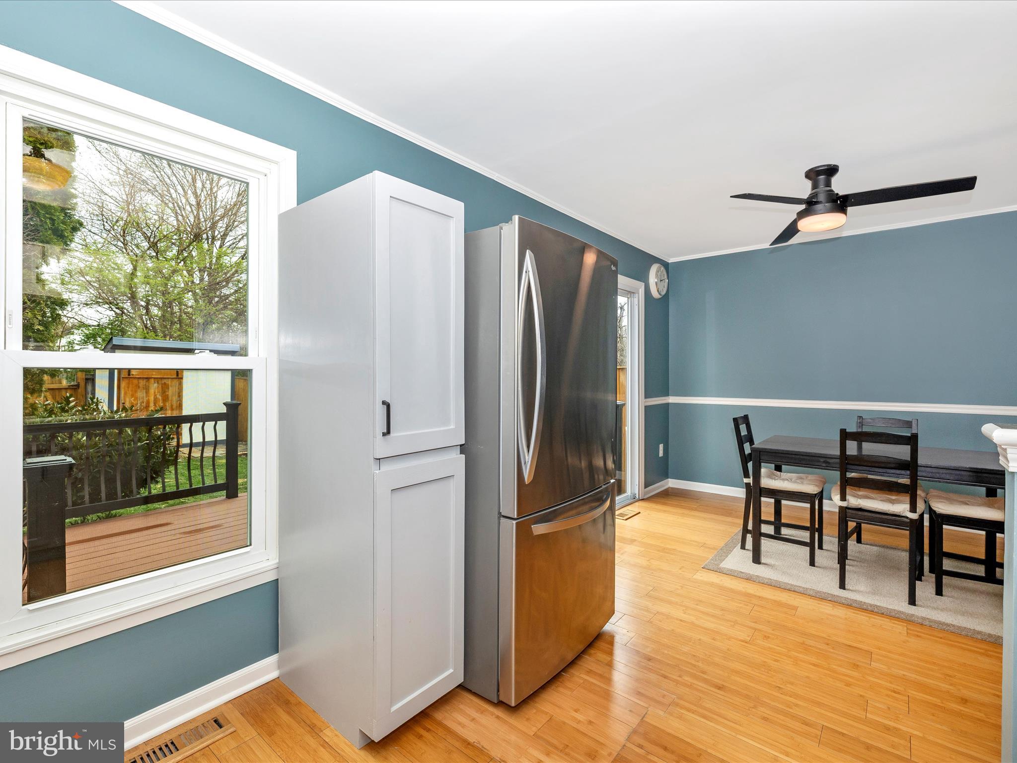1127 Daffodil Drive Frederick, MD 21703 - Photo 20 of 61 a kitchen with stainless steel appliances granite countertop a refrigerator and a stove top oven