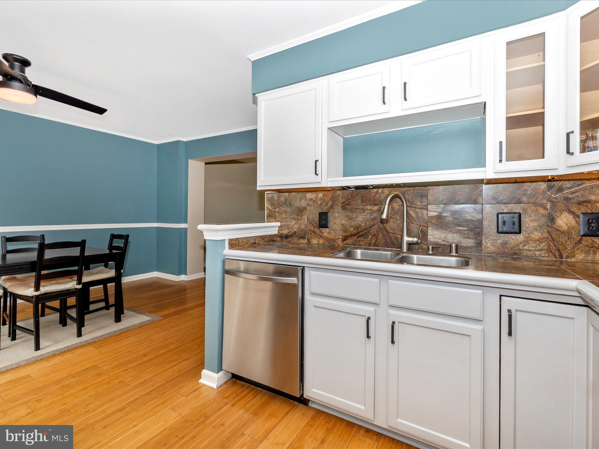 1127 Daffodil Drive Frederick, MD 21703 - Photo 21 of 61 a kitchen with a sink cabinets and wooden floor