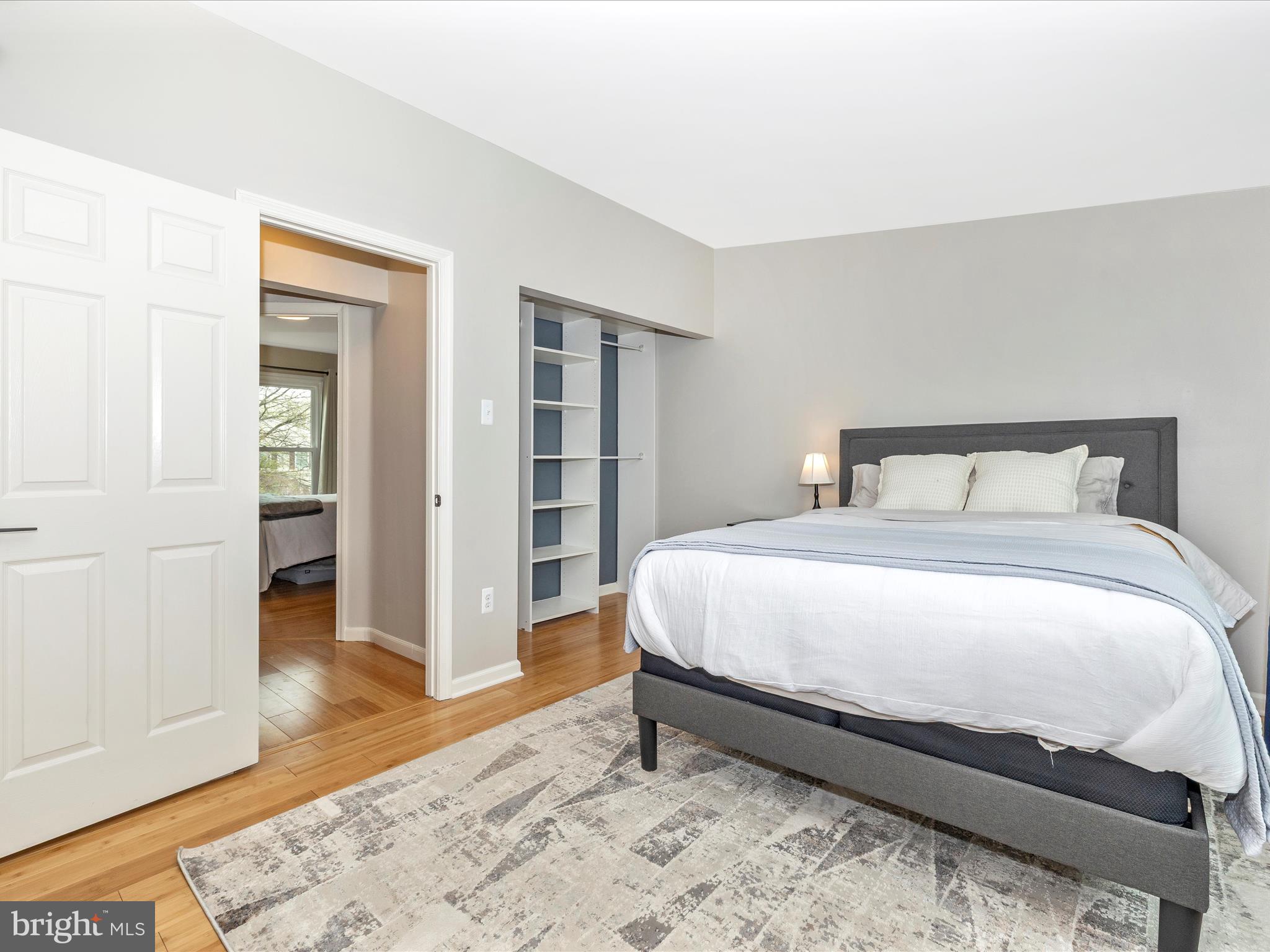 1127 Daffodil Drive Frederick, MD 21703 - Photo 28 of 61 a bedroom with a bed and wooden floor