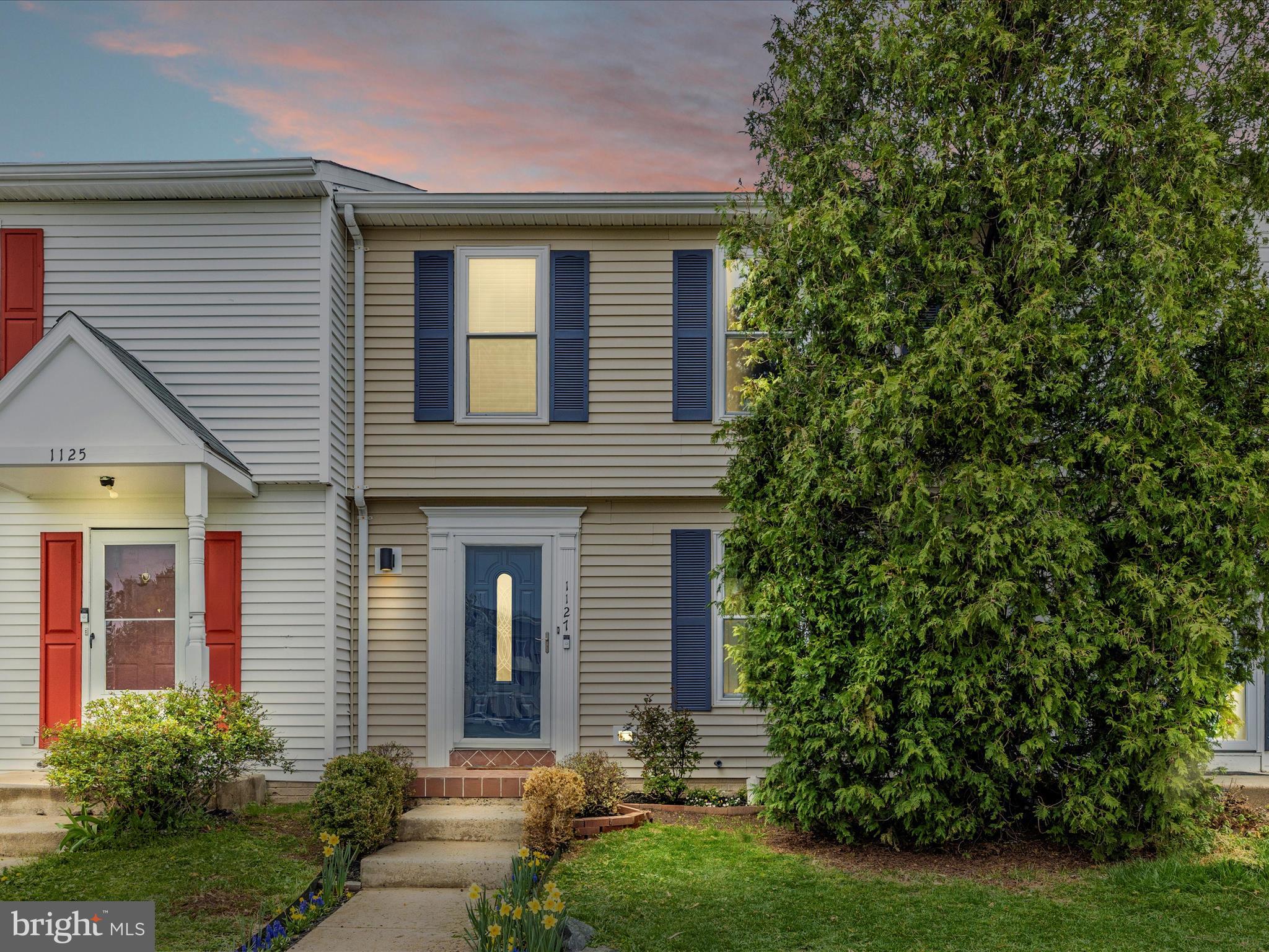 1127 Daffodil Drive Frederick, MD 21703 - Photo 3 of 61 a front view of a house with garden