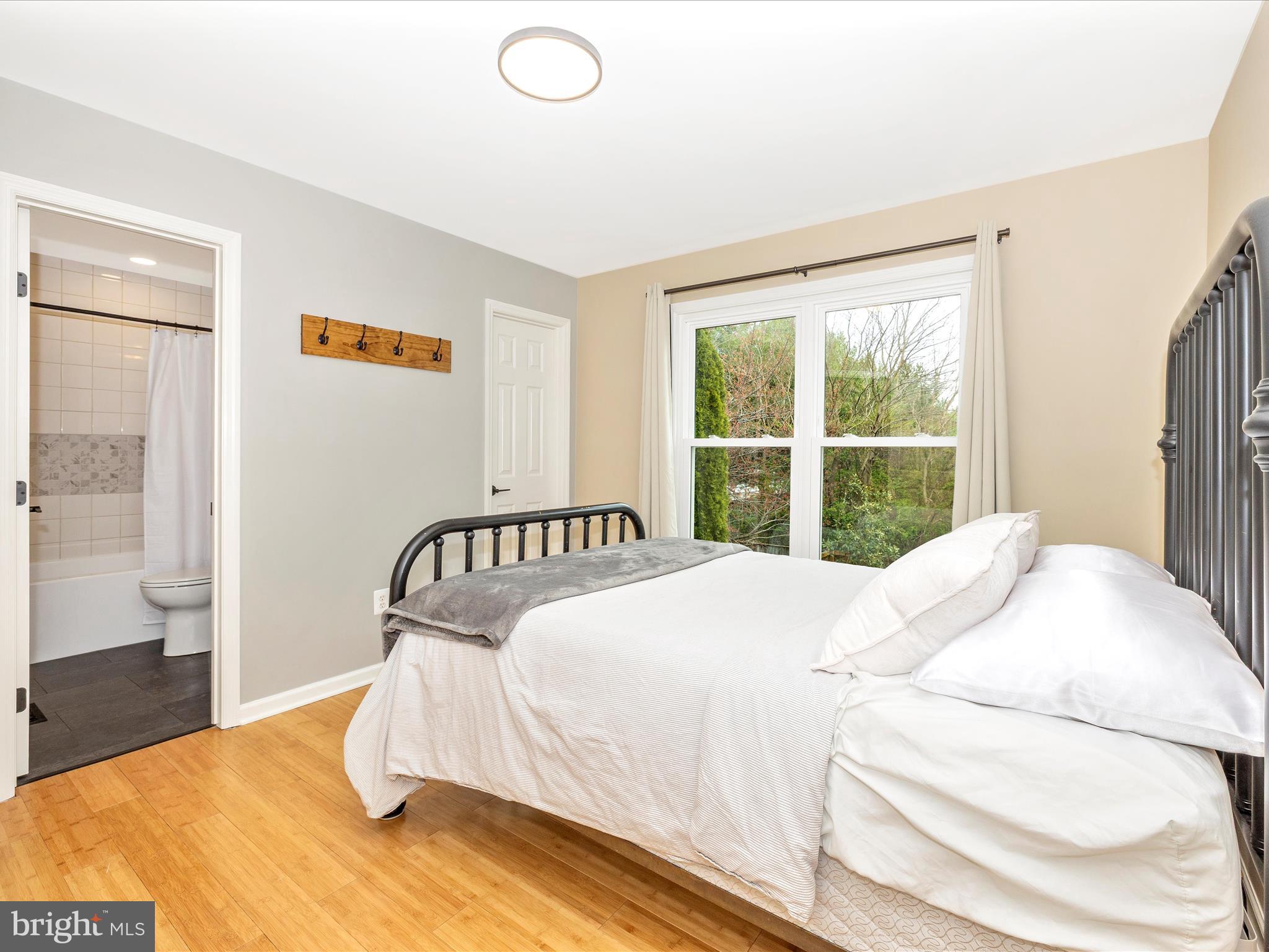 1127 Daffodil Drive Frederick, MD 21703 - Photo 32 of 61 a bedroom with a bed and a large window