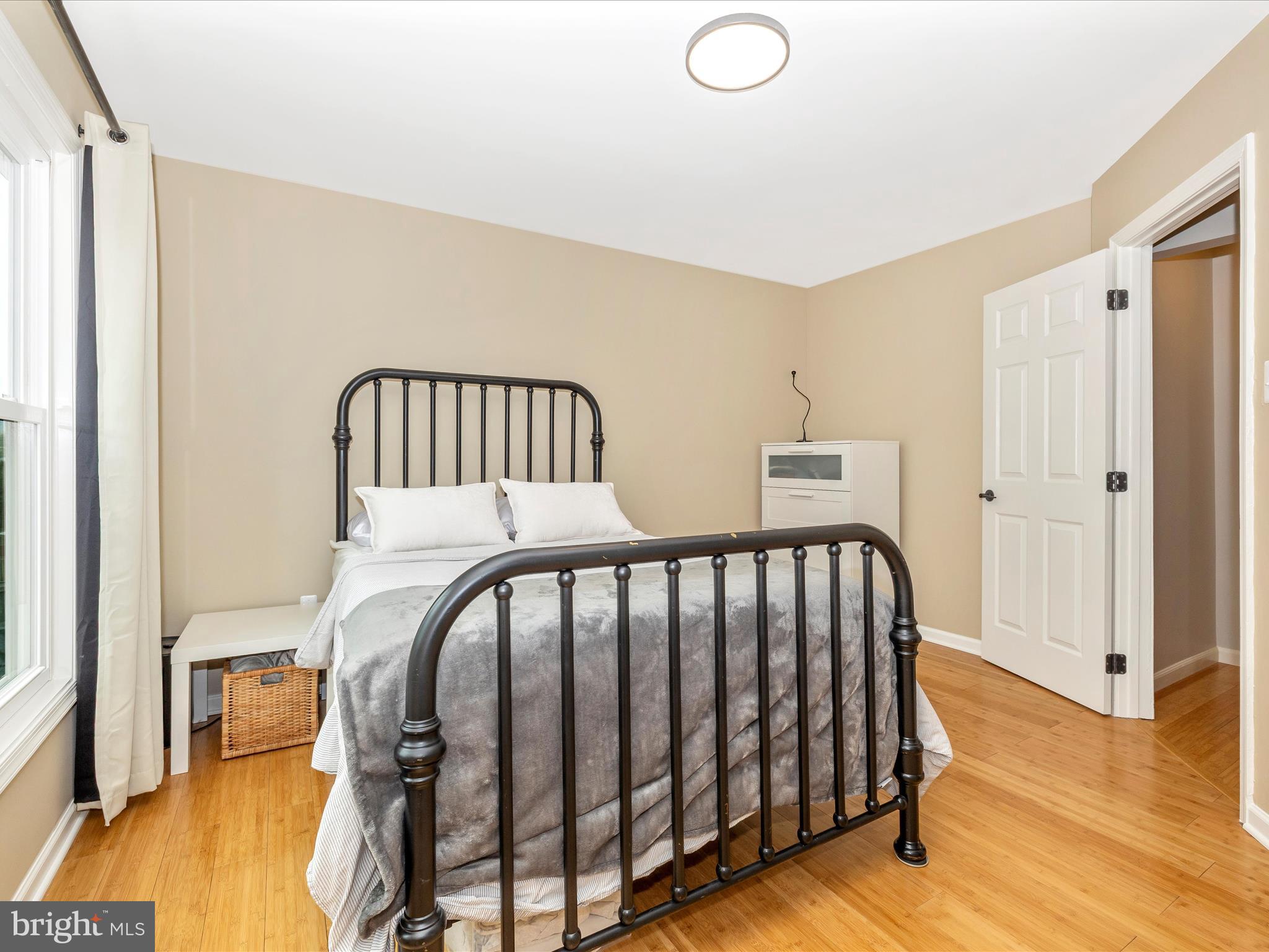 1127 Daffodil Drive Frederick, MD 21703 - Photo 33 of 61 a view of a bedroom with wooden floor