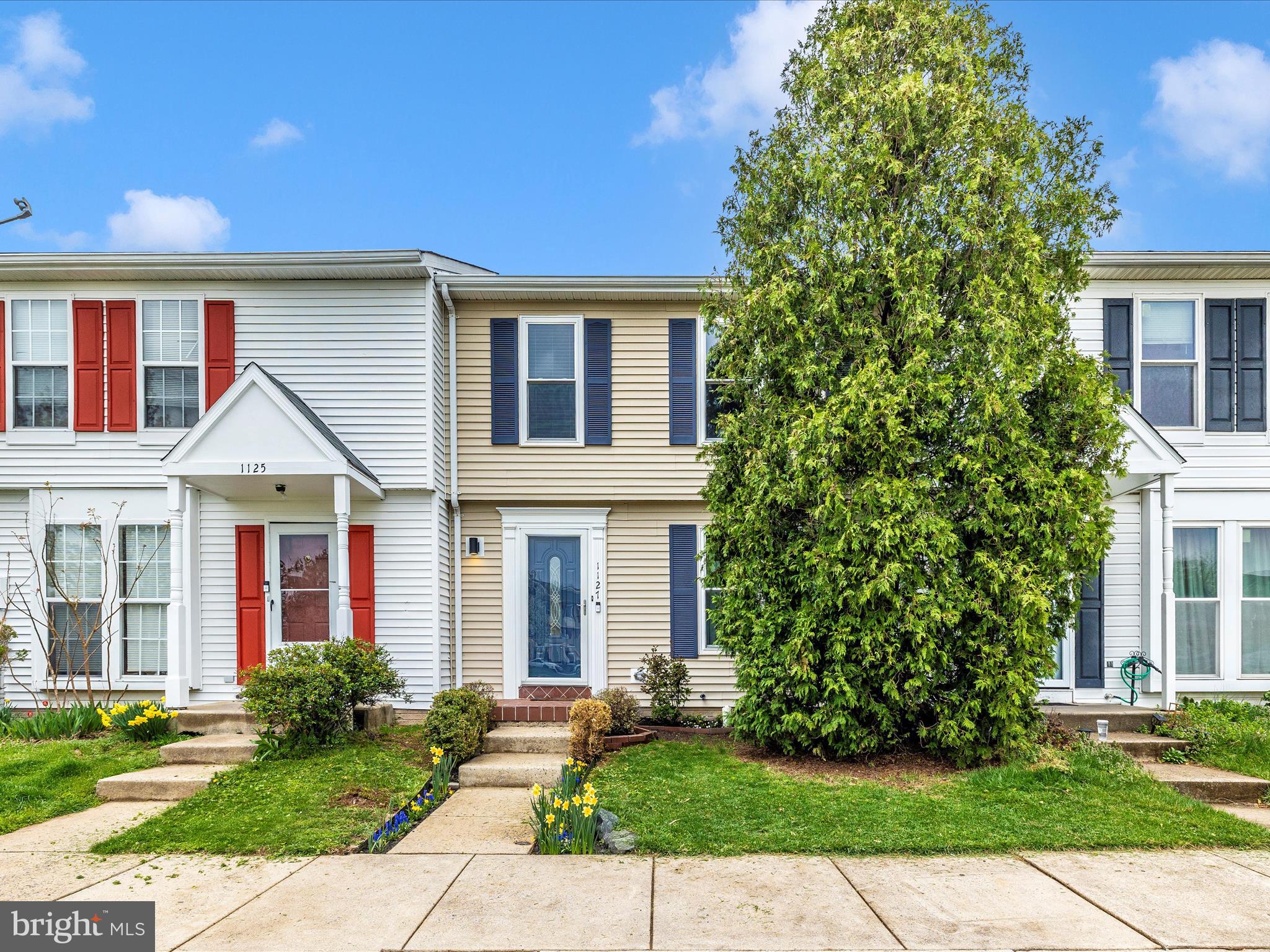 1127 Daffodil Drive Frederick, MD 21703 - Photo 43 of 61 a front view of a house with a yard