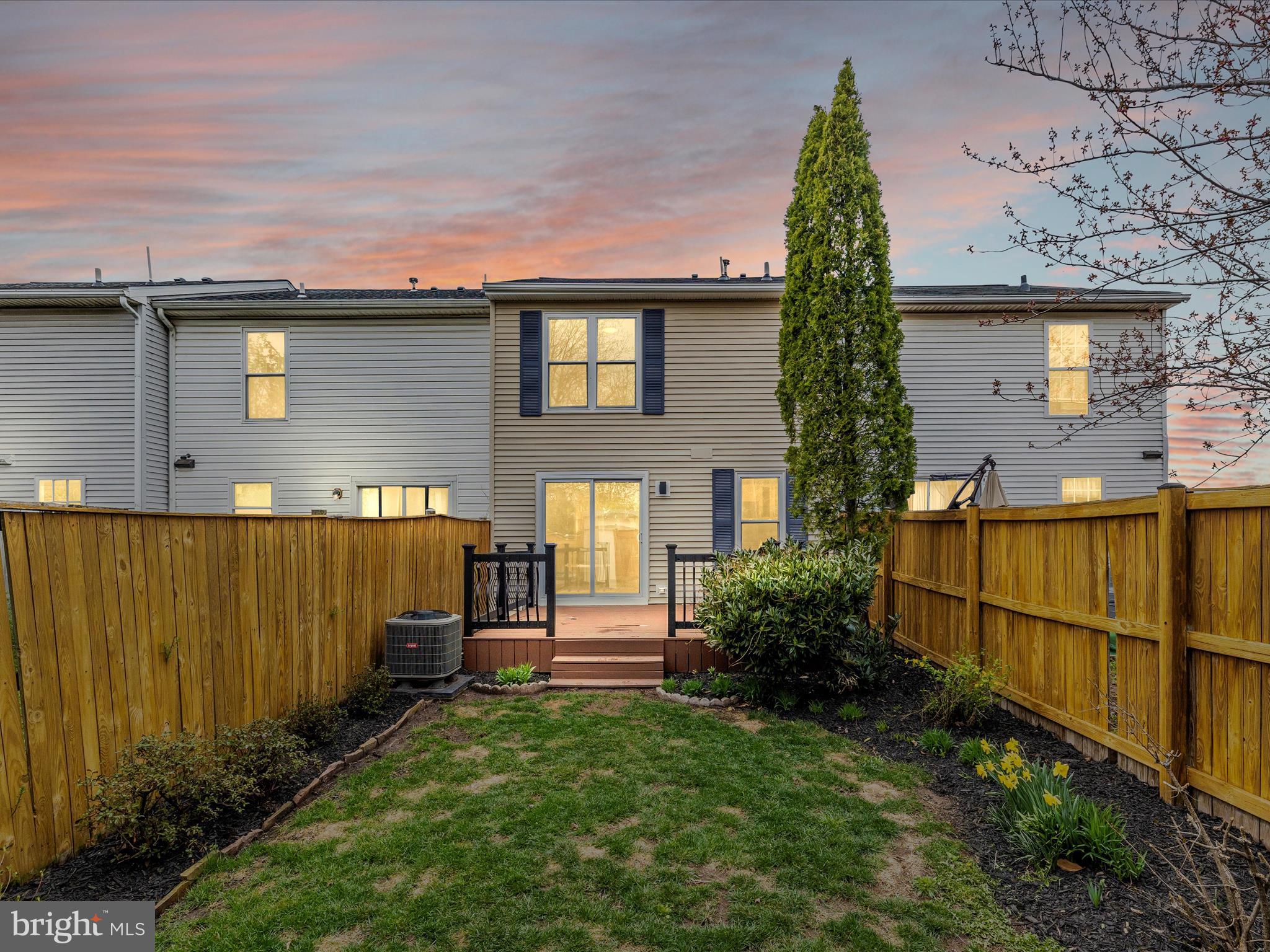 1127 Daffodil Drive Frederick, MD 21703 - Photo 50 of 61 a front view of a house with garden