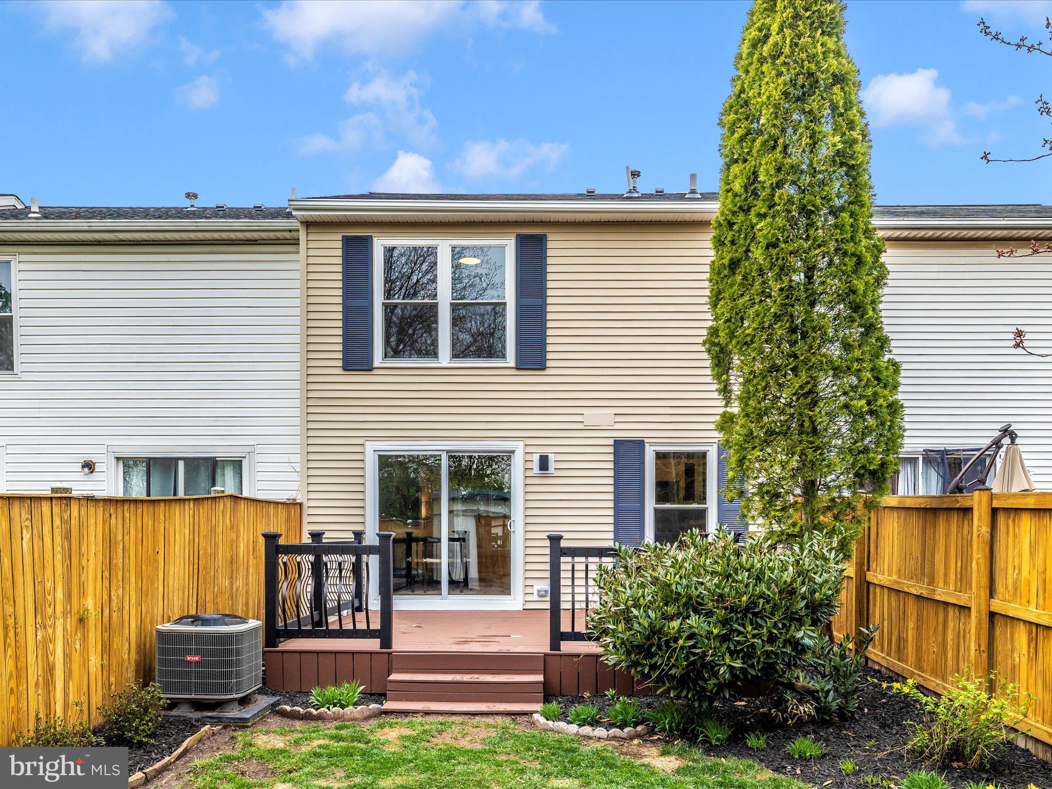 1127 Daffodil Drive Frederick, MD 21703 - Photo 51 of 61 a backyard of a house with a tree