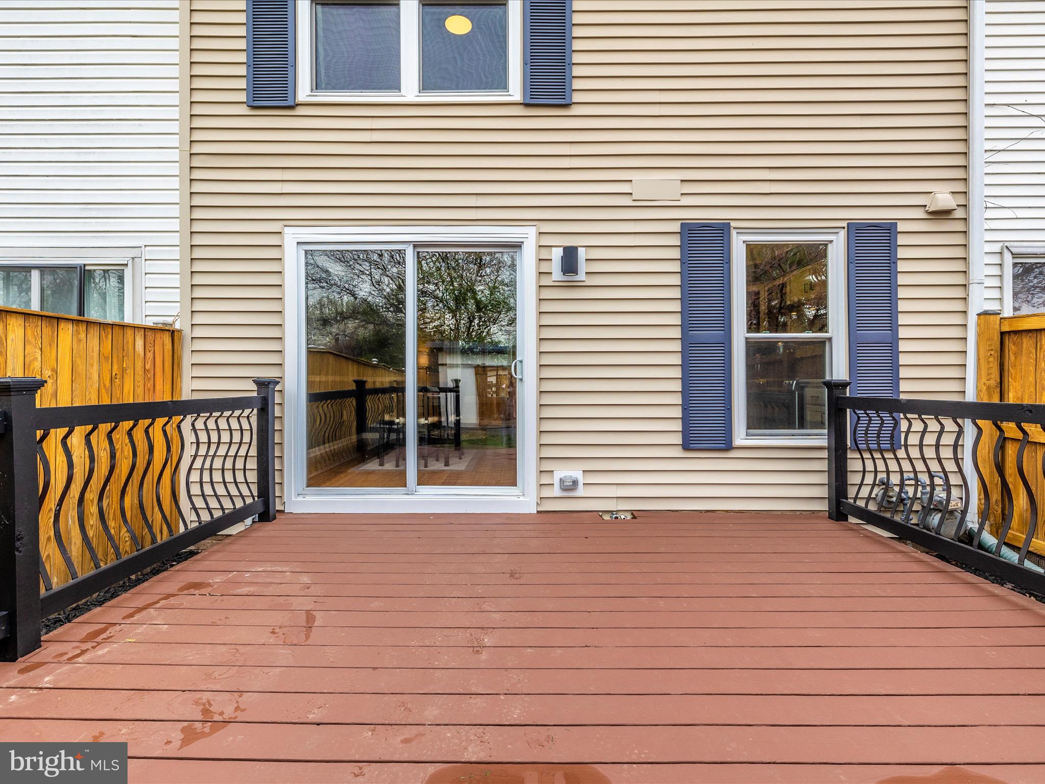 1127 Daffodil Drive Frederick, MD 21703 - Photo 53 of 61 a view of a house with wooden deck