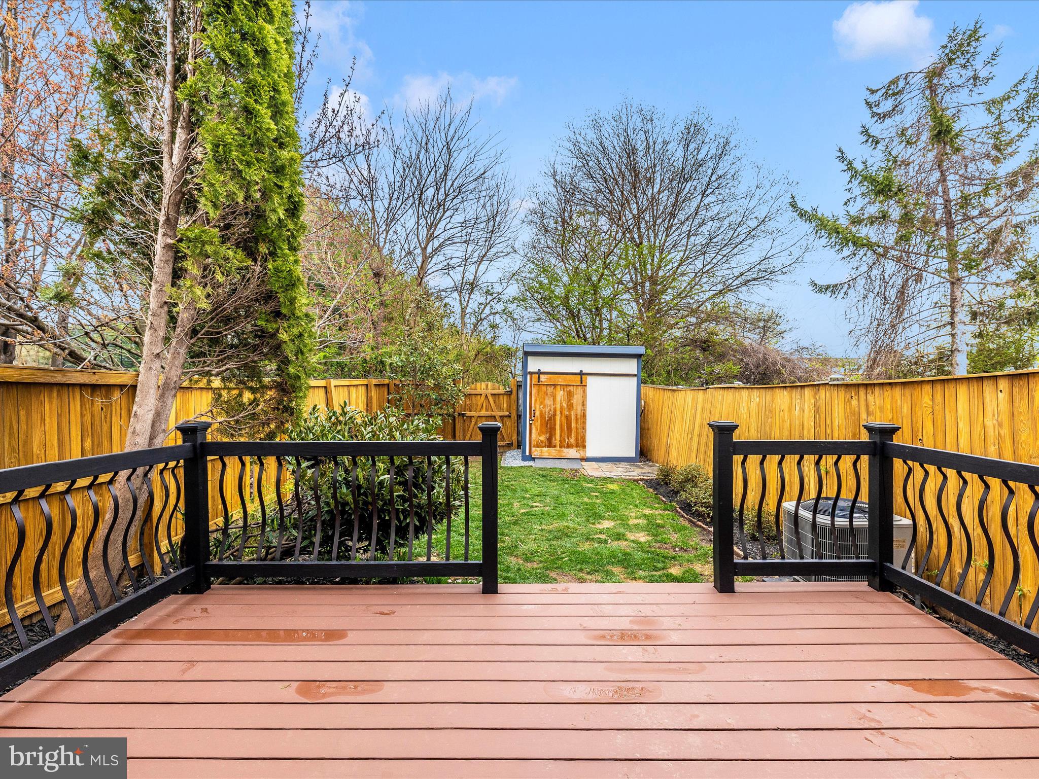 1127 Daffodil Drive Frederick, MD 21703 - Photo 54 of 61 a view of backyard with deck and garden