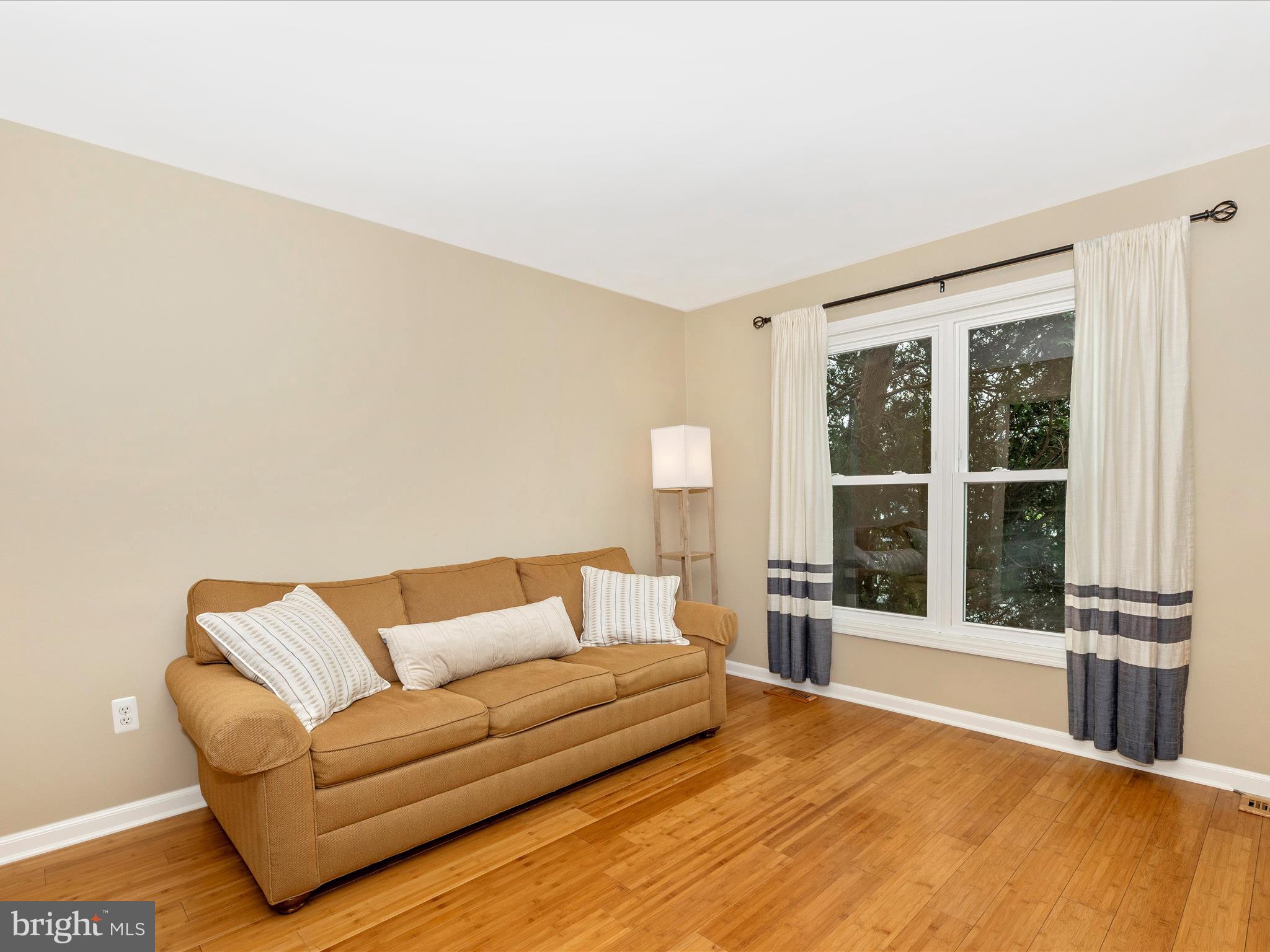 1127 Daffodil Drive Frederick, MD 21703 - Photo 7 of 61 a living room with furniture and a large window