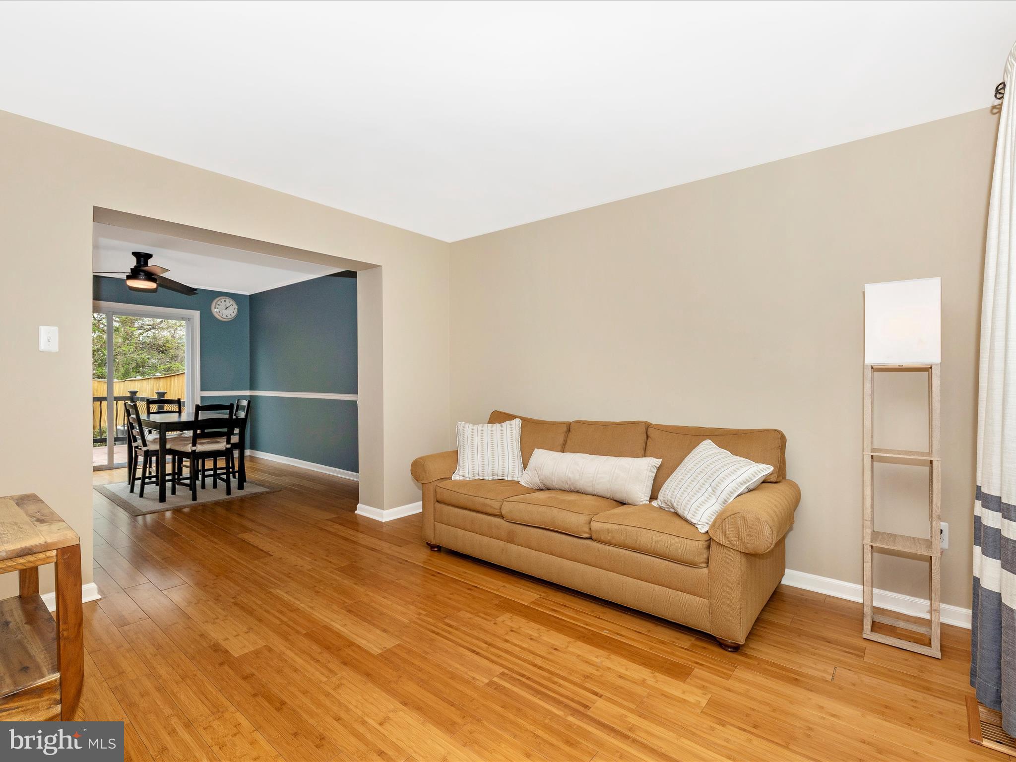 1127 Daffodil Drive Frederick, MD 21703 - Photo 9 of 61 a living room with furniture and a wooden floor