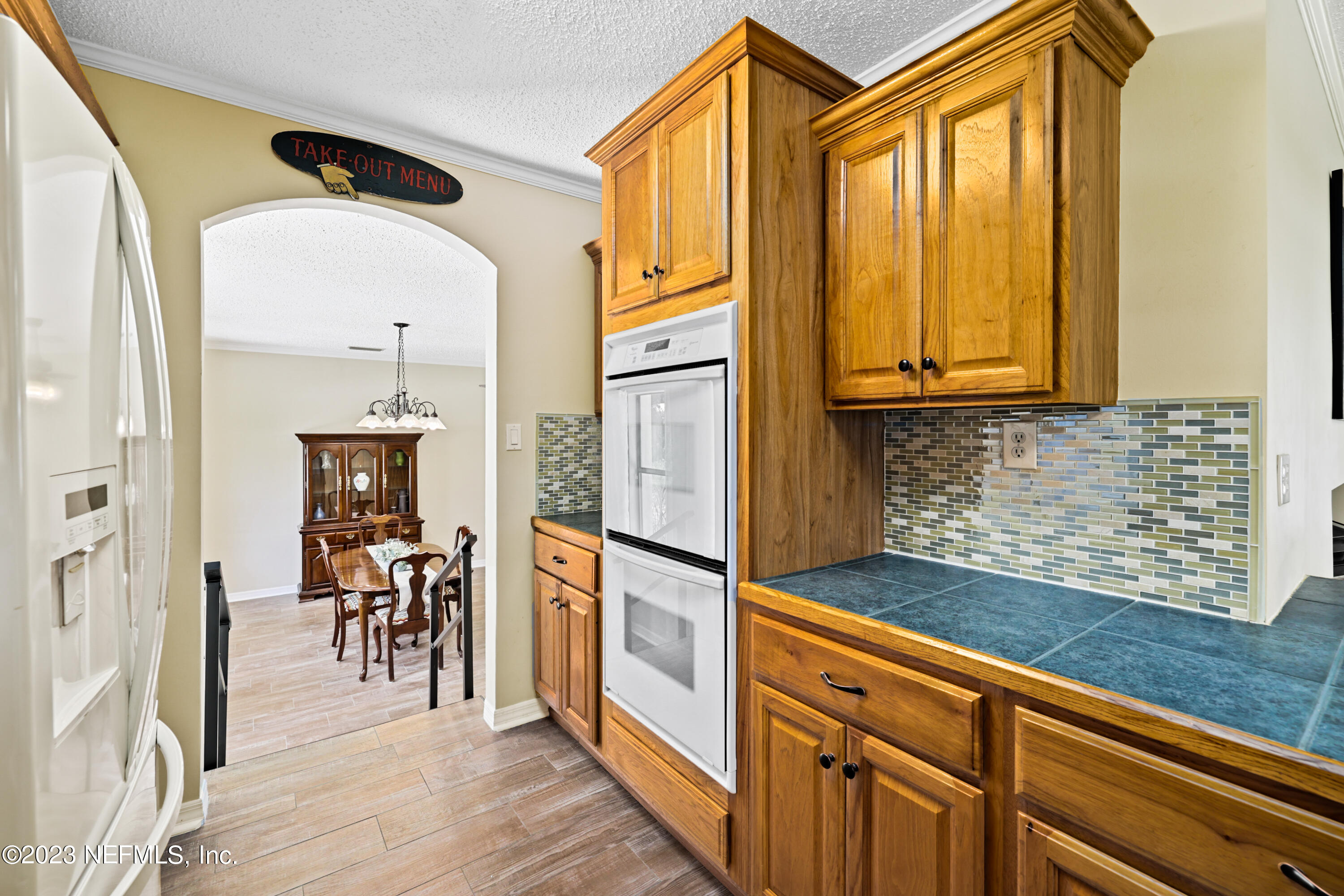 716 Cedar Creek Road Palatka, FL 32177 - Photo 20 of 62 a view of a hallway with wooden floor and staircase