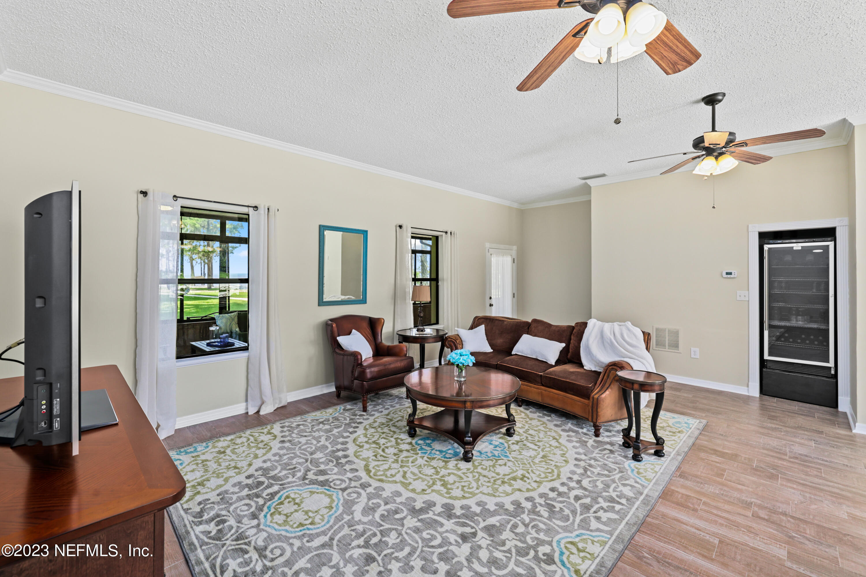 716 Cedar Creek Road Palatka, FL 32177 - Photo 22 of 62 a living room with furniture rug and window