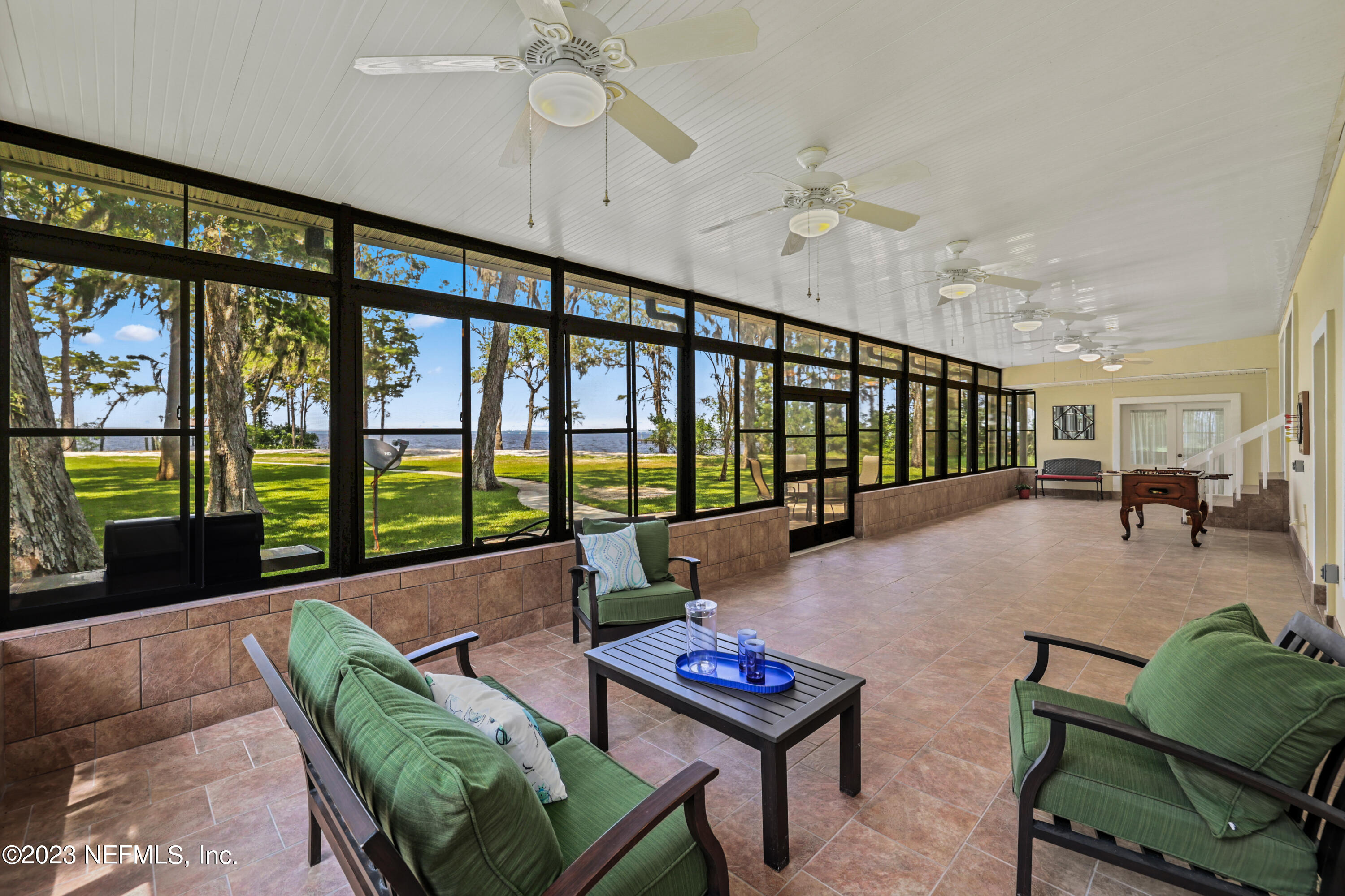 716 Cedar Creek Road Palatka, FL 32177 - Photo 28 of 62 a living room with furniture and a large window