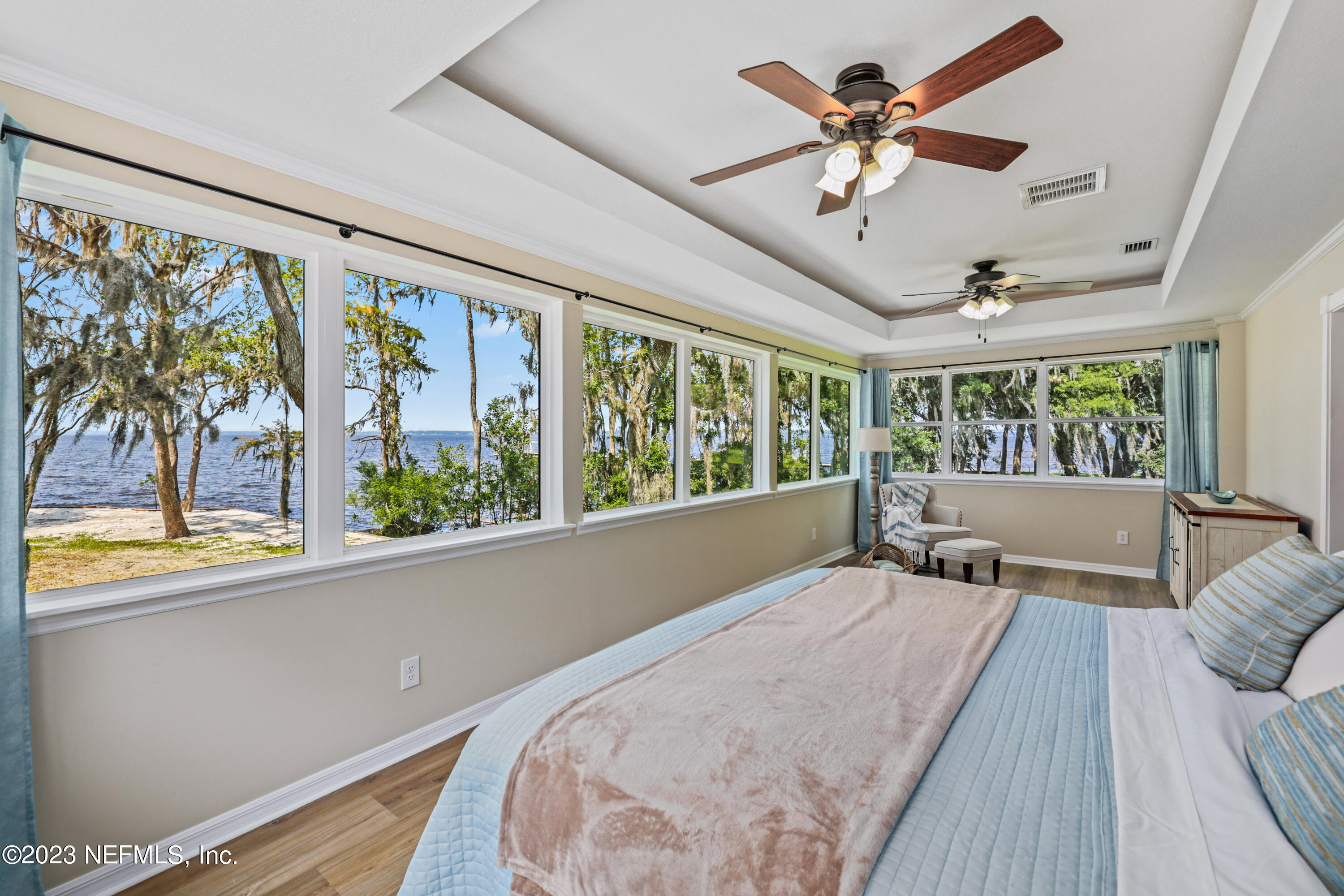 716 Cedar Creek Road Palatka, FL 32177 - Photo 35 of 62 a bed sitting in a spacious bedroom next to a window