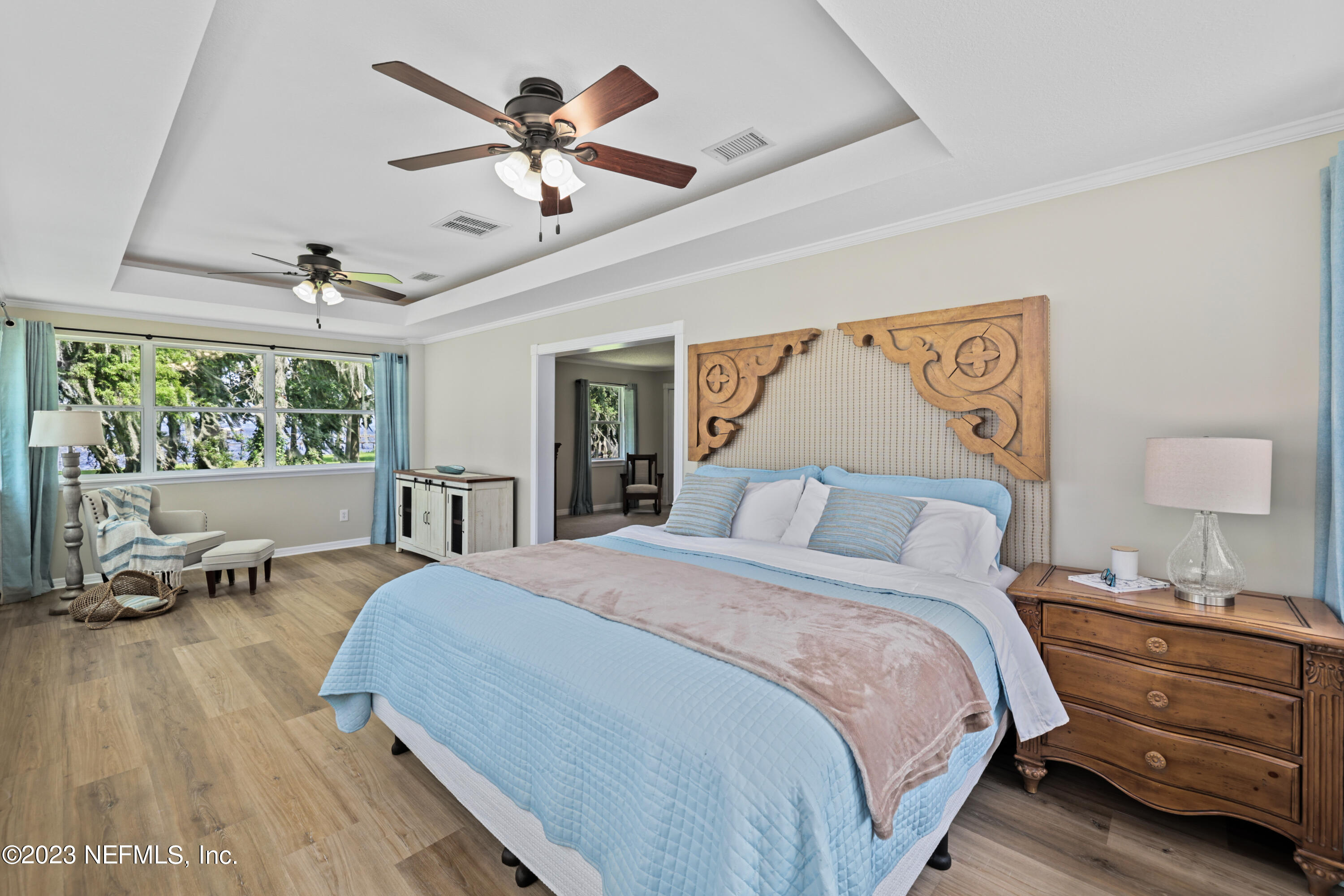 716 Cedar Creek Road Palatka, FL 32177 - Photo 37 of 62 a bedroom with a bed and a large window