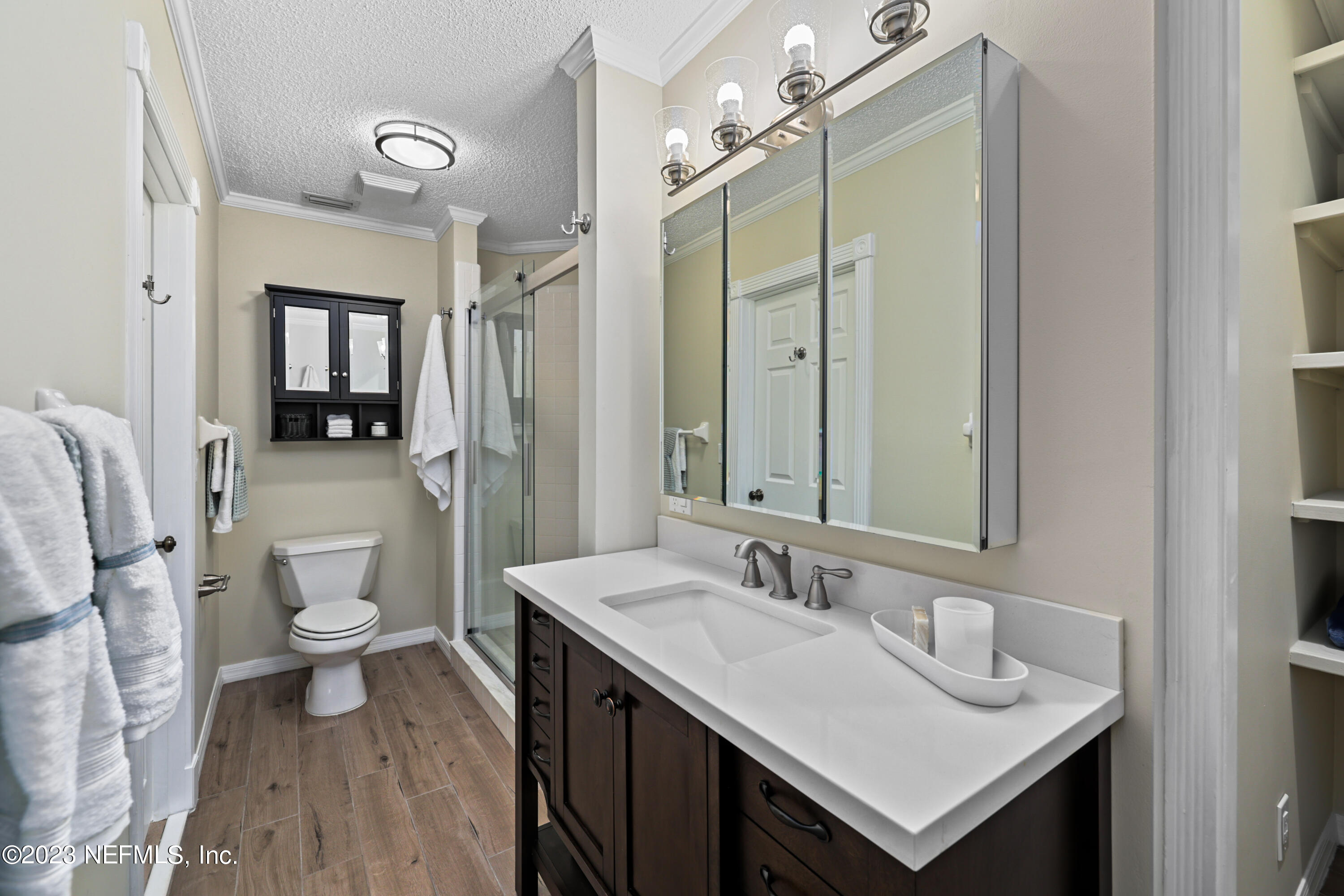 716 Cedar Creek Road Palatka, FL 32177 - Photo 41 of 62 a bathroom with a sink a toilet a shower and a mirror