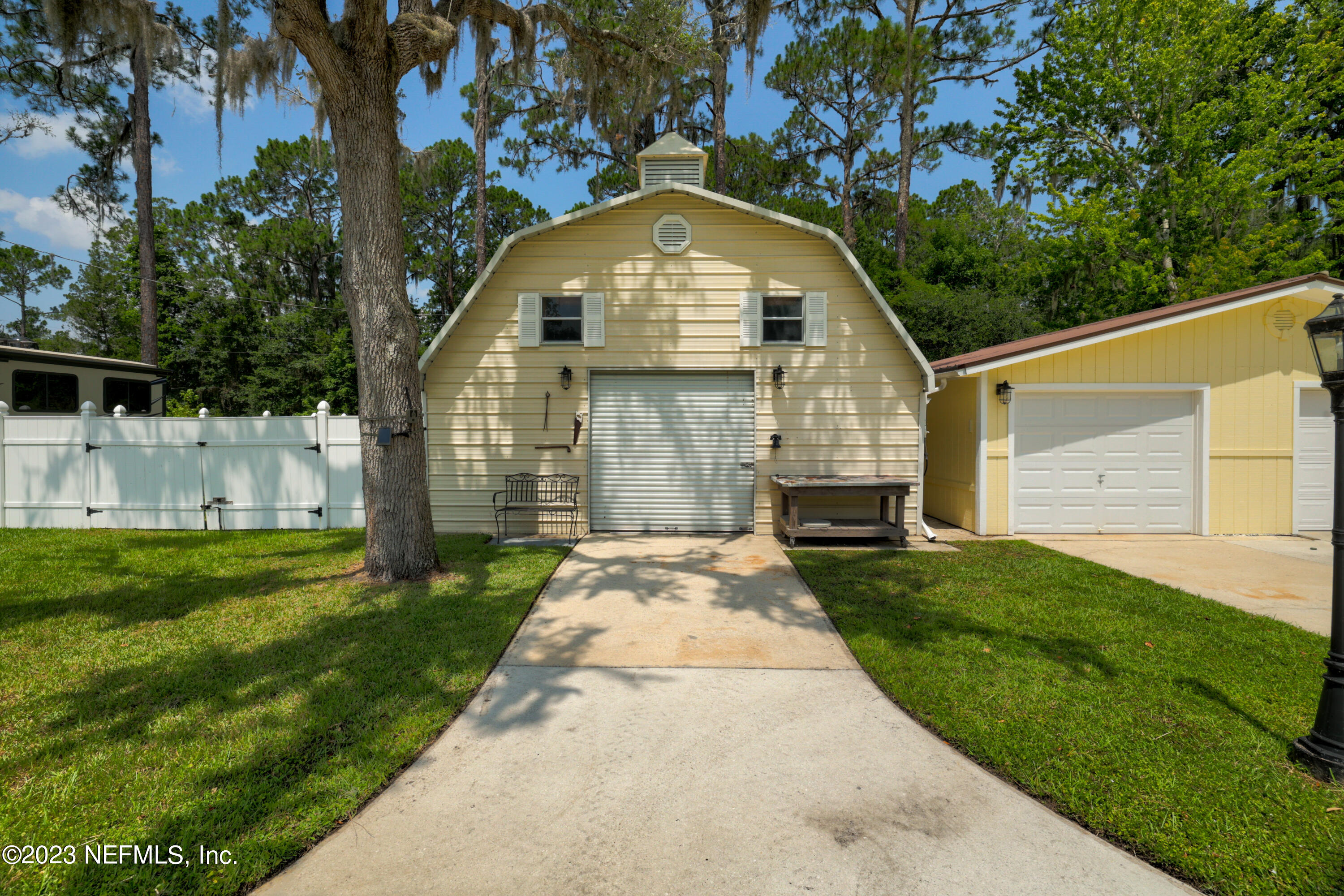 716 Cedar Creek Road Palatka, FL 32177 - Photo 59 of 62 a front view of a house with garden
