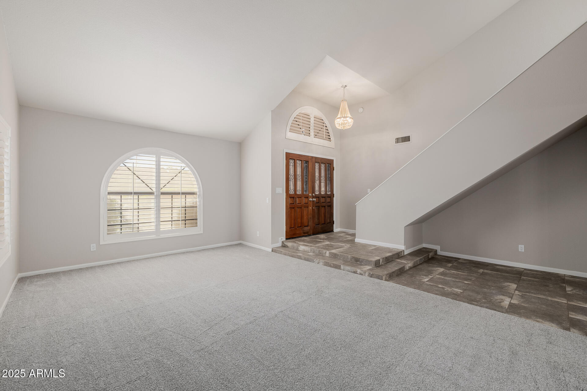 16809 South 33rd Way Phoenix, AZ 85048 - Photo 15 of 118 an empty room with windows and fireplace