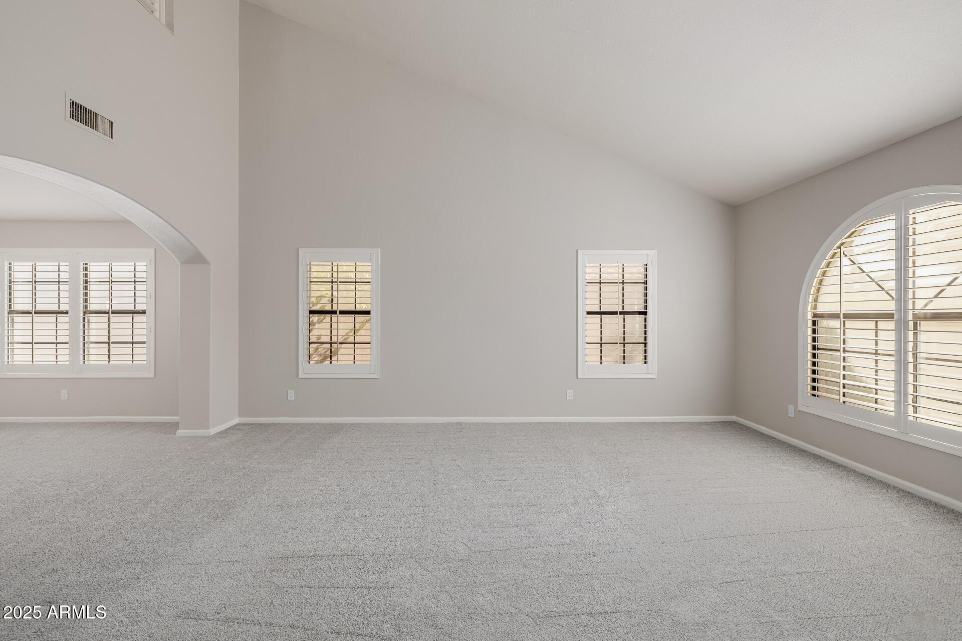 16809 South 33rd Way Phoenix, AZ 85048 - Photo 20 of 118 an empty room with windows