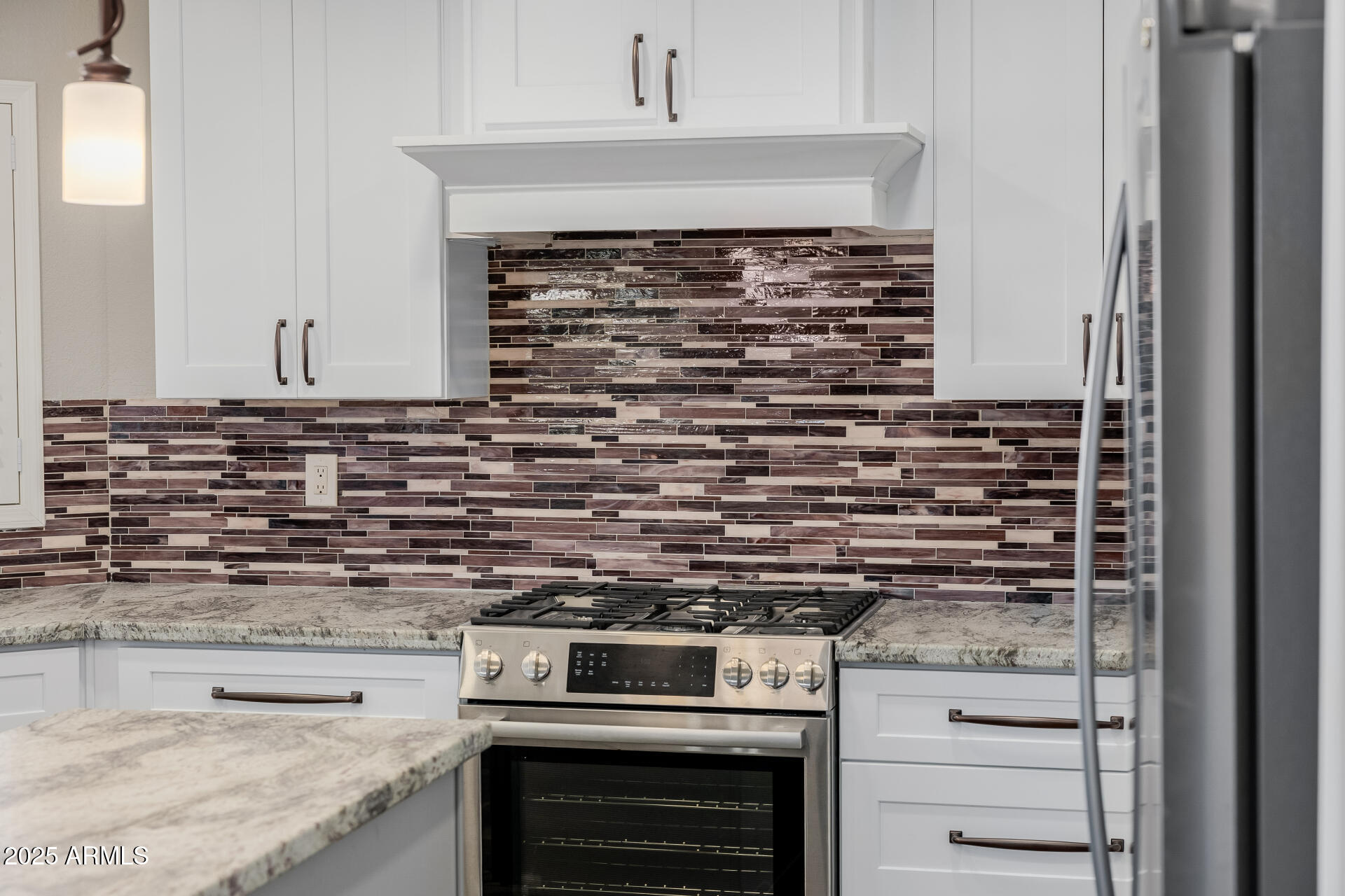 16809 South 33rd Way Phoenix, AZ 85048 - Photo 46 of 118 a kitchen with granite countertop a stove and a sink