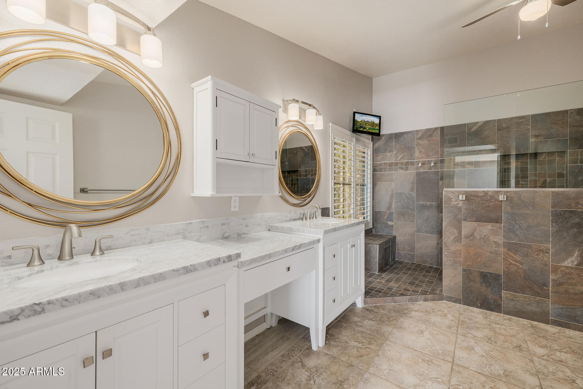 16809 South 33rd Way Phoenix, AZ 85048 - Photo 59 of 118 a bathroom with a granite countertop double vanity and a mirror