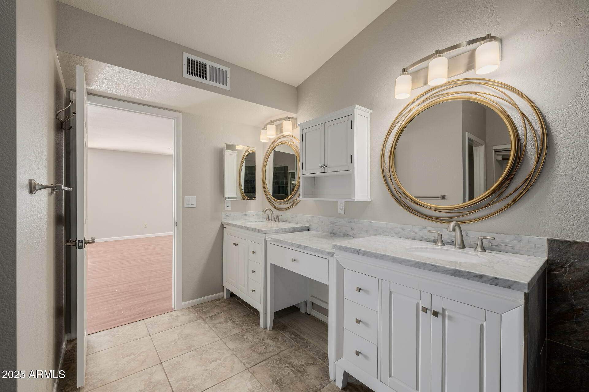 16809 South 33rd Way Phoenix, AZ 85048 - Photo 63 of 118 a bathroom with a granite countertop double vanity sink and a mirror