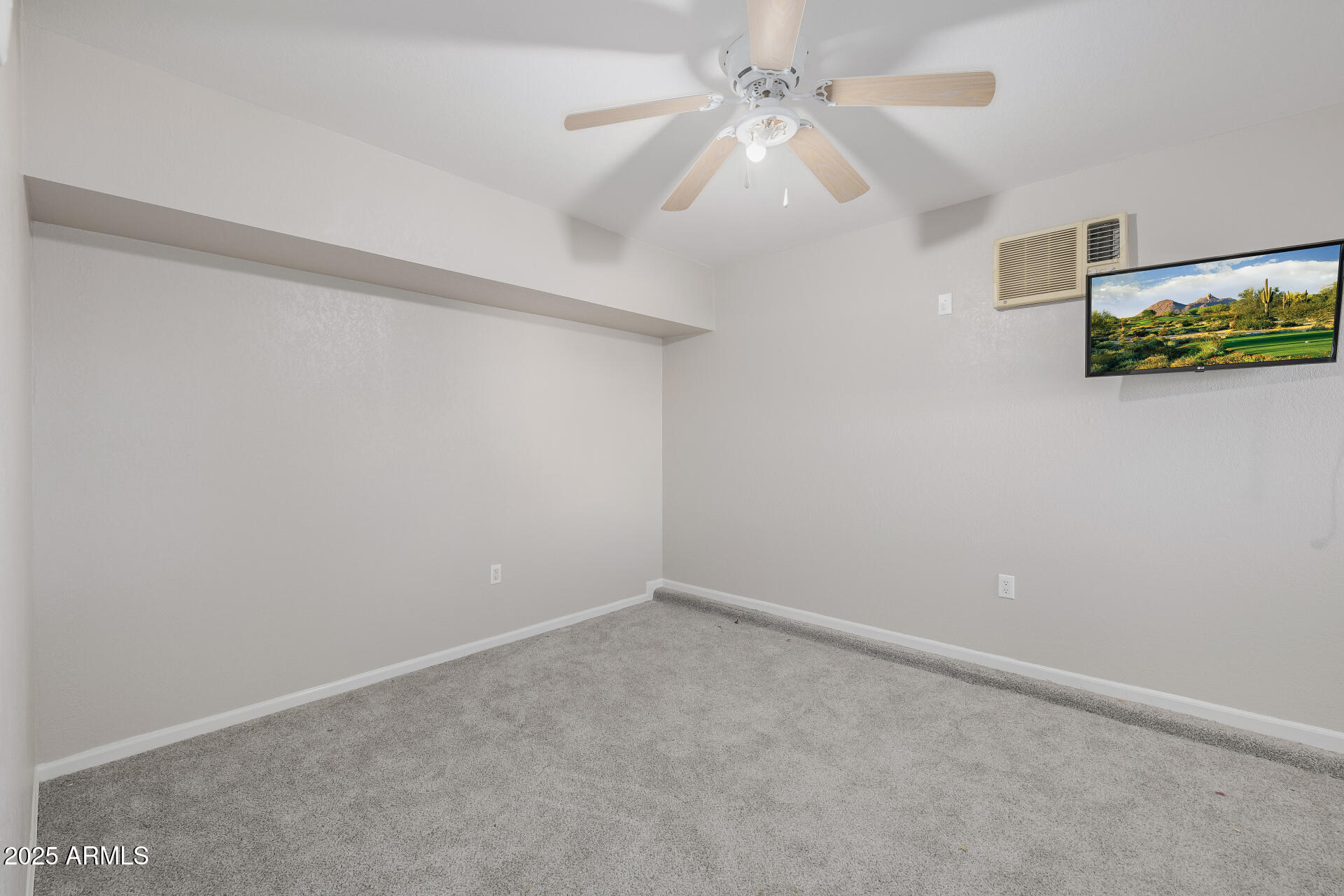 16809 South 33rd Way Phoenix, AZ 85048 - Photo 66 of 118 an empty room with a window and a fan