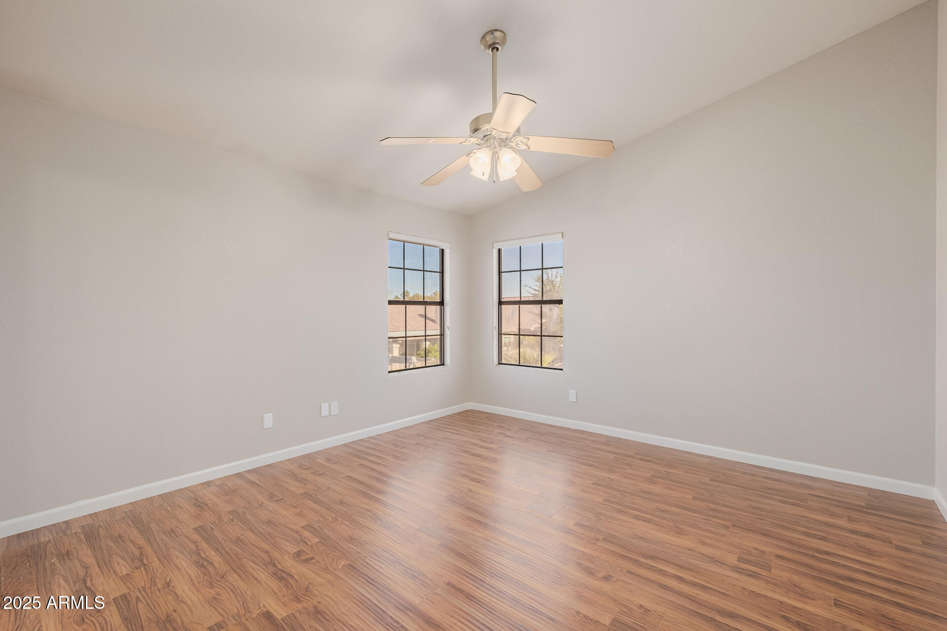 16809 South 33rd Way Phoenix, AZ 85048 - Photo 75 of 118 wooden floor in an empty room with a window