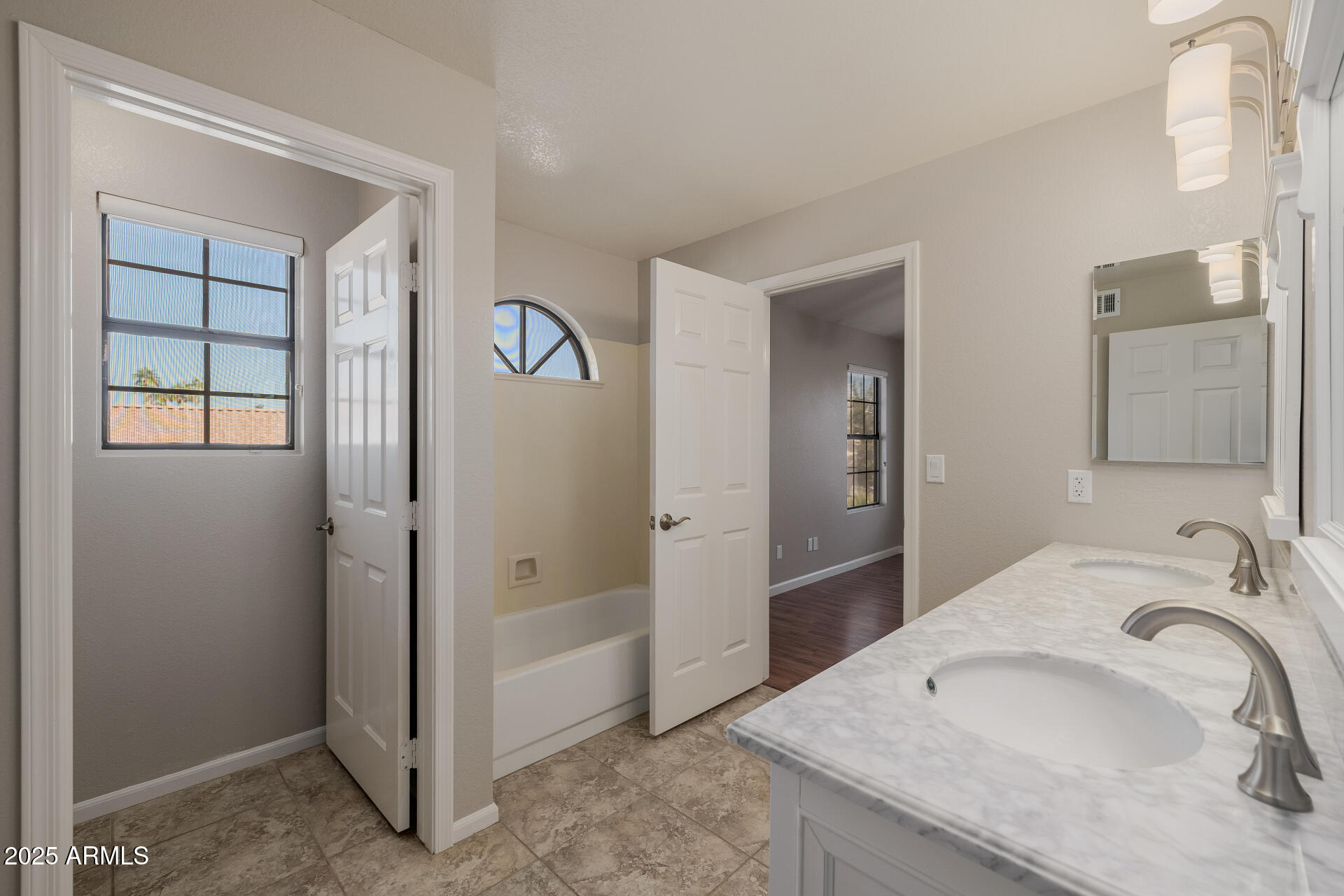 16809 South 33rd Way Phoenix, AZ 85048 - Photo 79 of 118 a bathroom with a granite countertop sink and a mirror