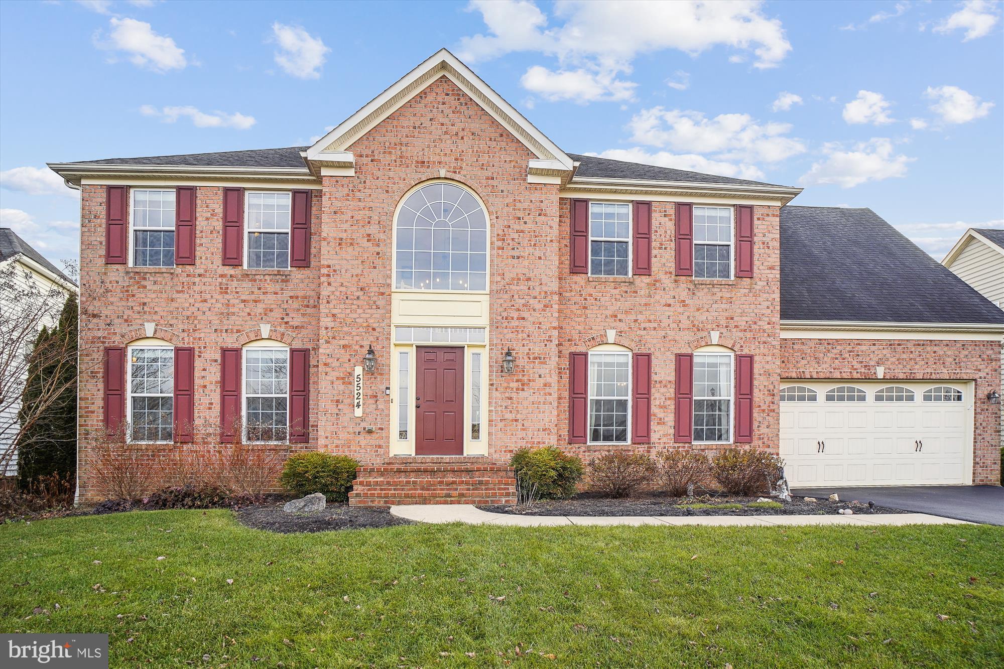 5524 Young Family Trail West Adamstown, MD 21710 - Photo 1 of 39 a front view of a house with a yard