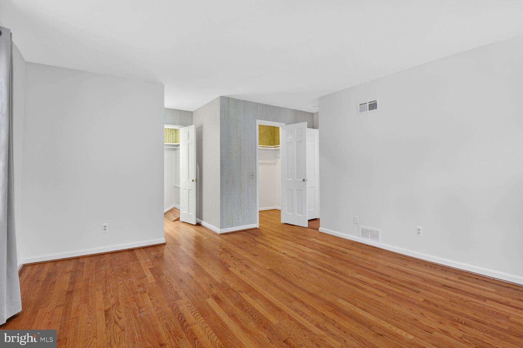 4709 River Road Bethesda, MD 20816 - Photo 18 of 25 a view of empty room with wooden floor