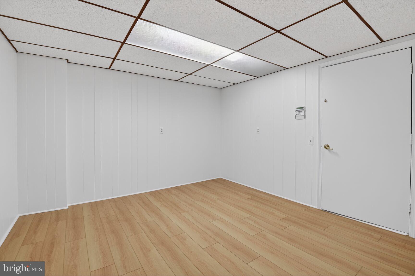 4709 River Road Bethesda, MD 20816 - Photo 24 of 25 a view of a room with wooden floor