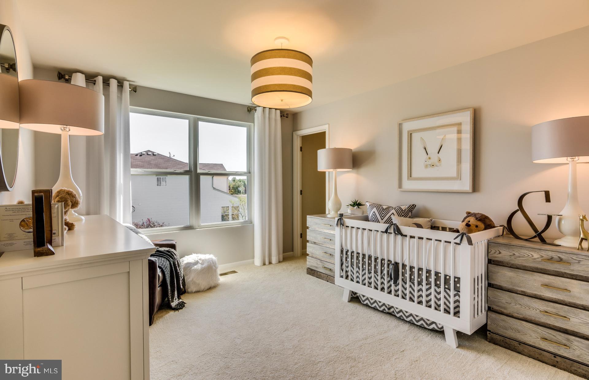 14528 Sourgum Road Boyds, MD 20841 - Photo 4 of 18 a bedroom with furniture and a window