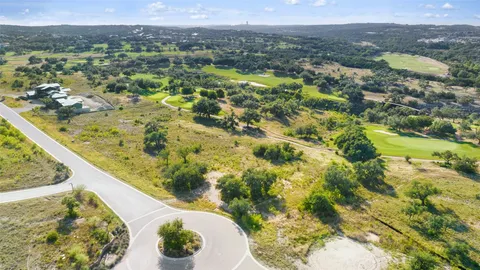 a view of a lake with a city