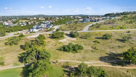 a view of a yard with a trees