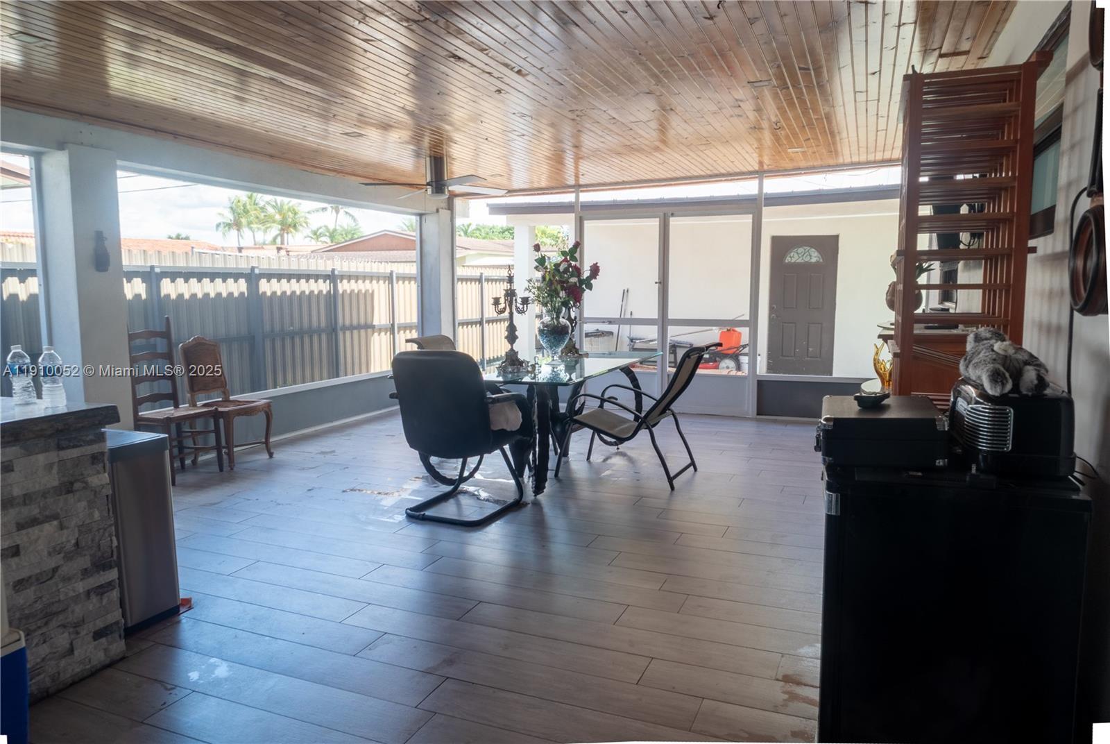 3541 Southwest 105th Court Miami, FL 33165 - Photo 19 of 22 a view of a dining room with furniture window and outside view