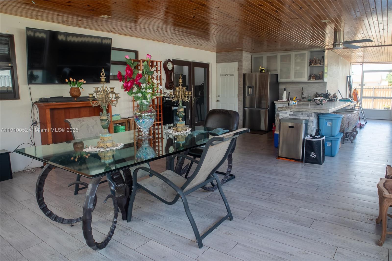 3541 Southwest 105th Court Miami, FL 33165 - Photo 20 of 22 a view of a dining room with furniture and a potted plant